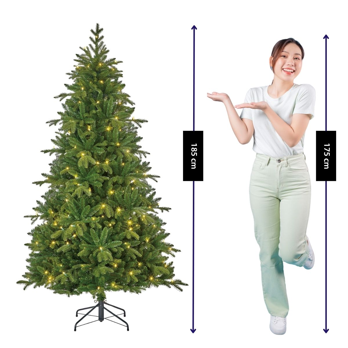 Een lijdende vrouw naast een verlichte kerstboom, met hoogte-indicaties van 185 cm en 175 cm.