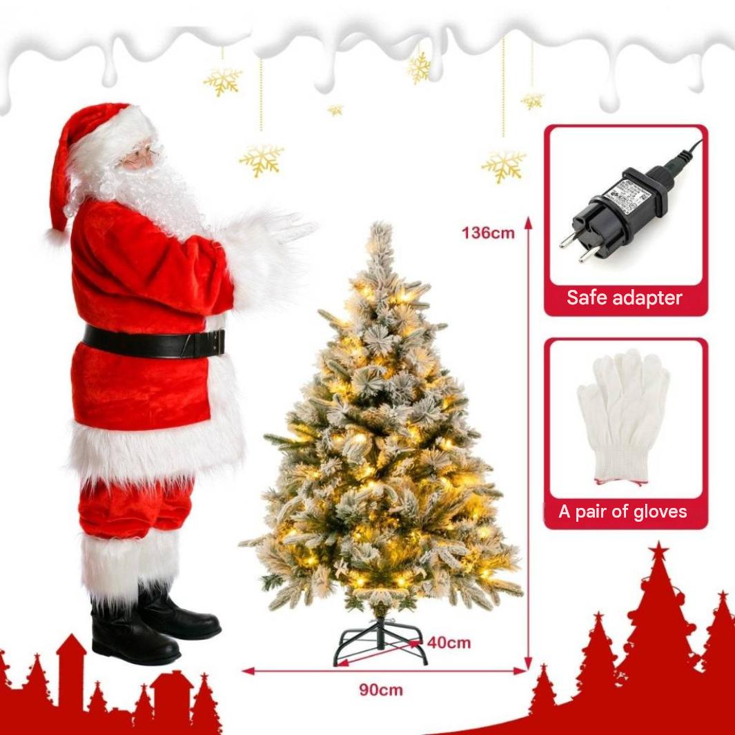 Le Père Noël se tient près d'un sapin illuminé avec dimensions, adaptateur et gants.