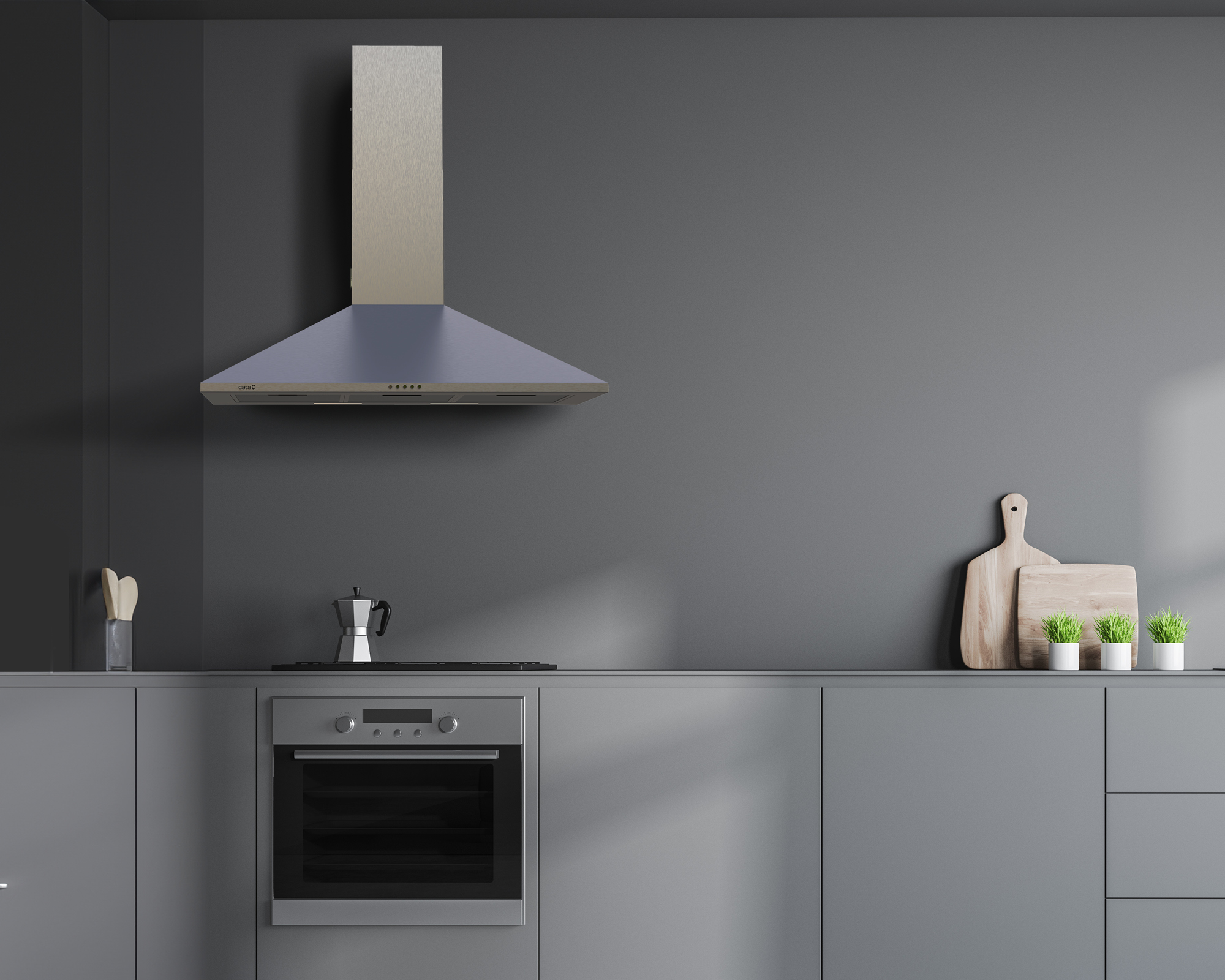 Moderna cucina grigia con forno, cappa, caffettiera, taglieri in legno e piccole piante.