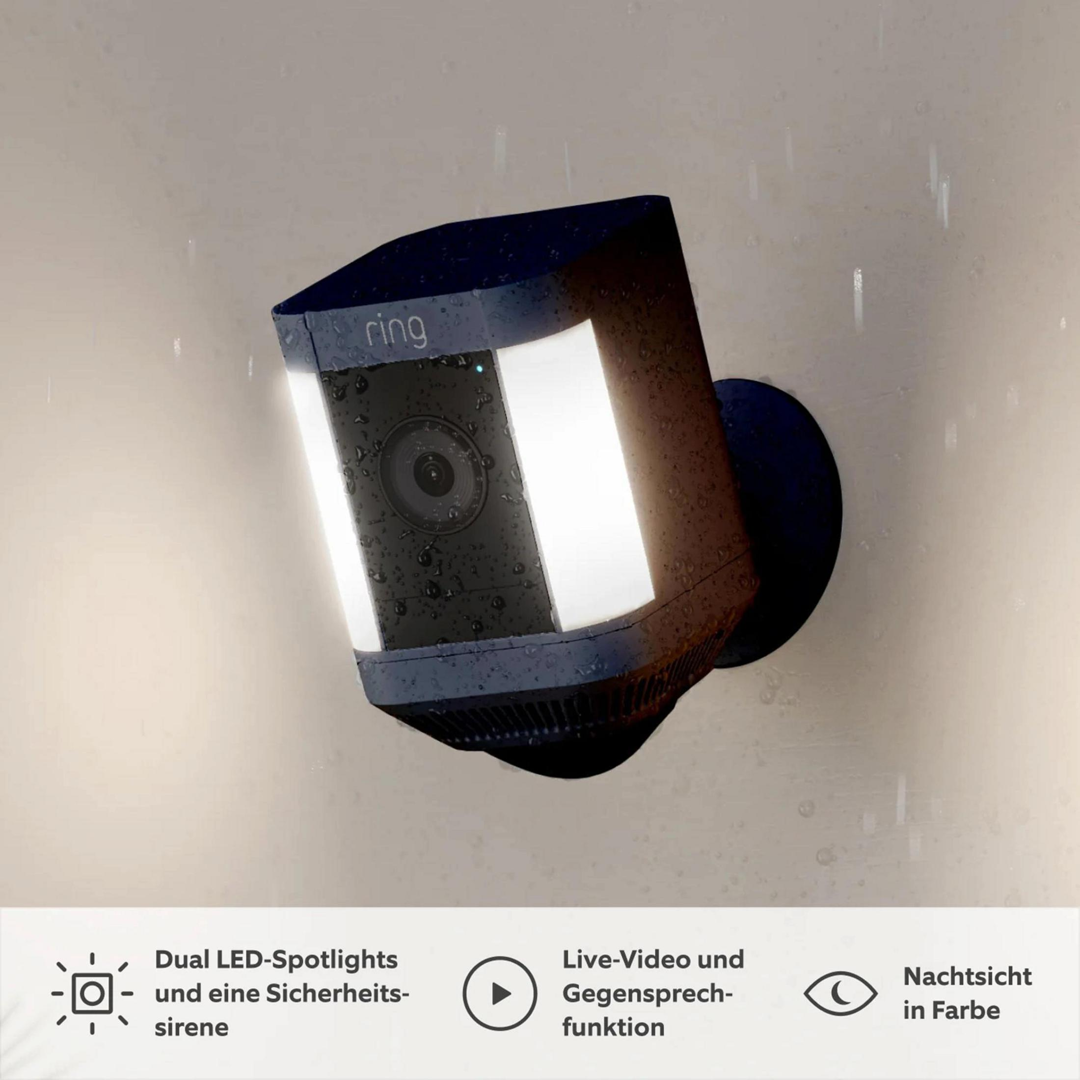 Cámara de seguridad Ring impermeable con focos LED brillantes y descripciones de funciones en alemán.