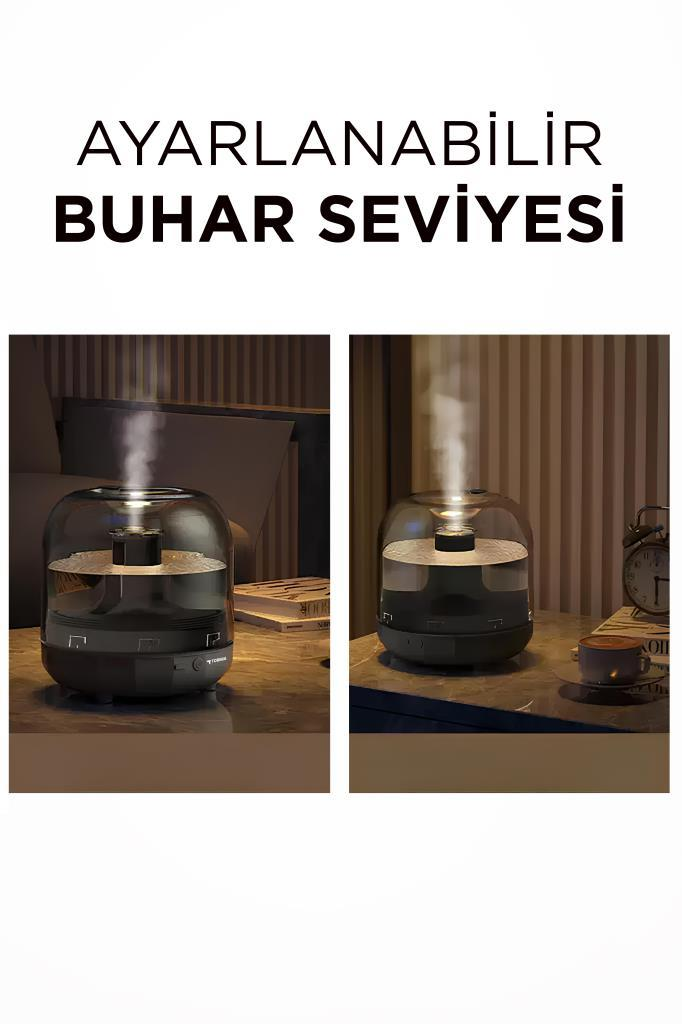 Bir masada ayarlanabilir buhar seviyelerine sahip siyah bir hava nemlendiricinin iki görüntüsü.