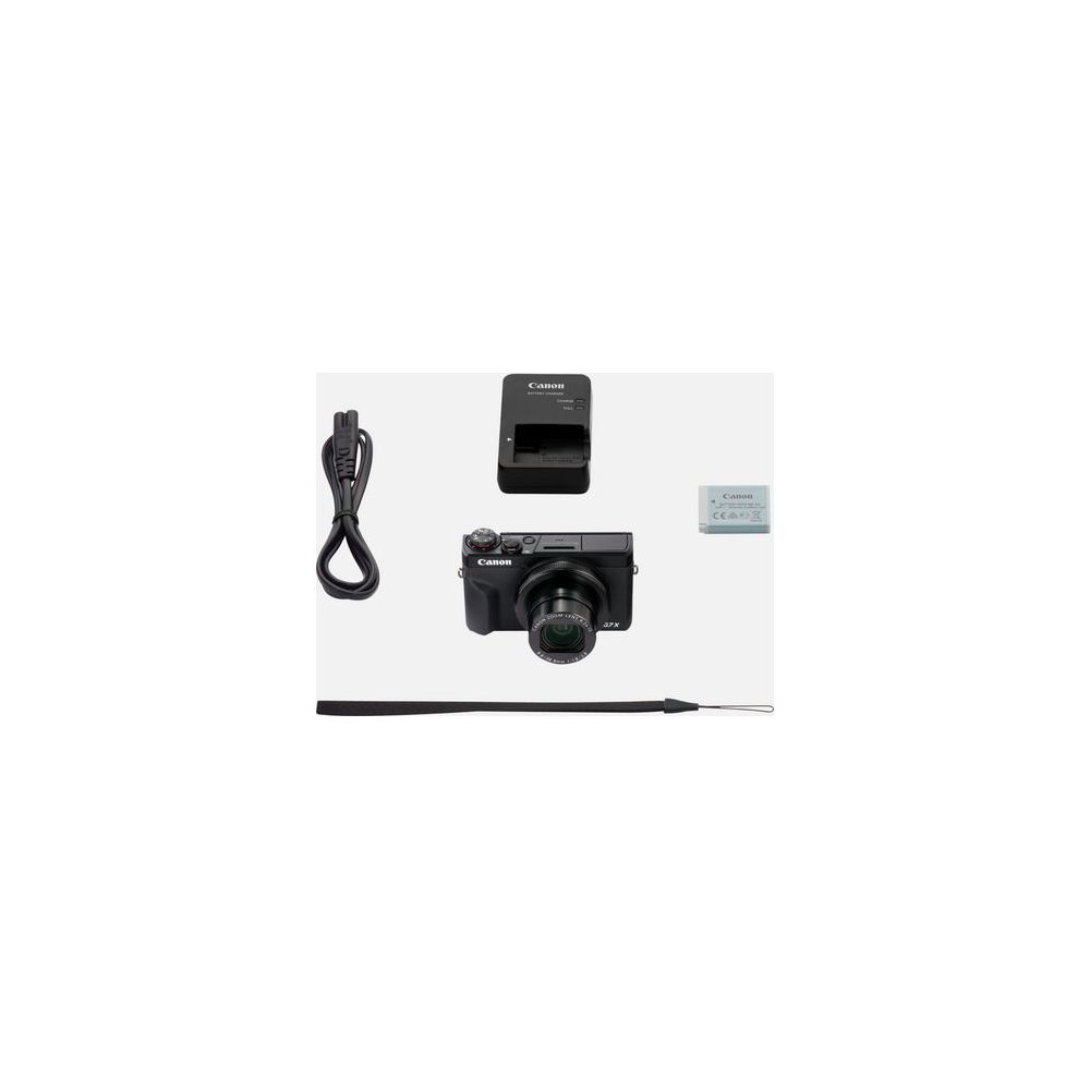 Fotocamera compatta Canon nera con caricabatterie, batteria, cavo di alimentazione e cinturino su sfondo bianco.