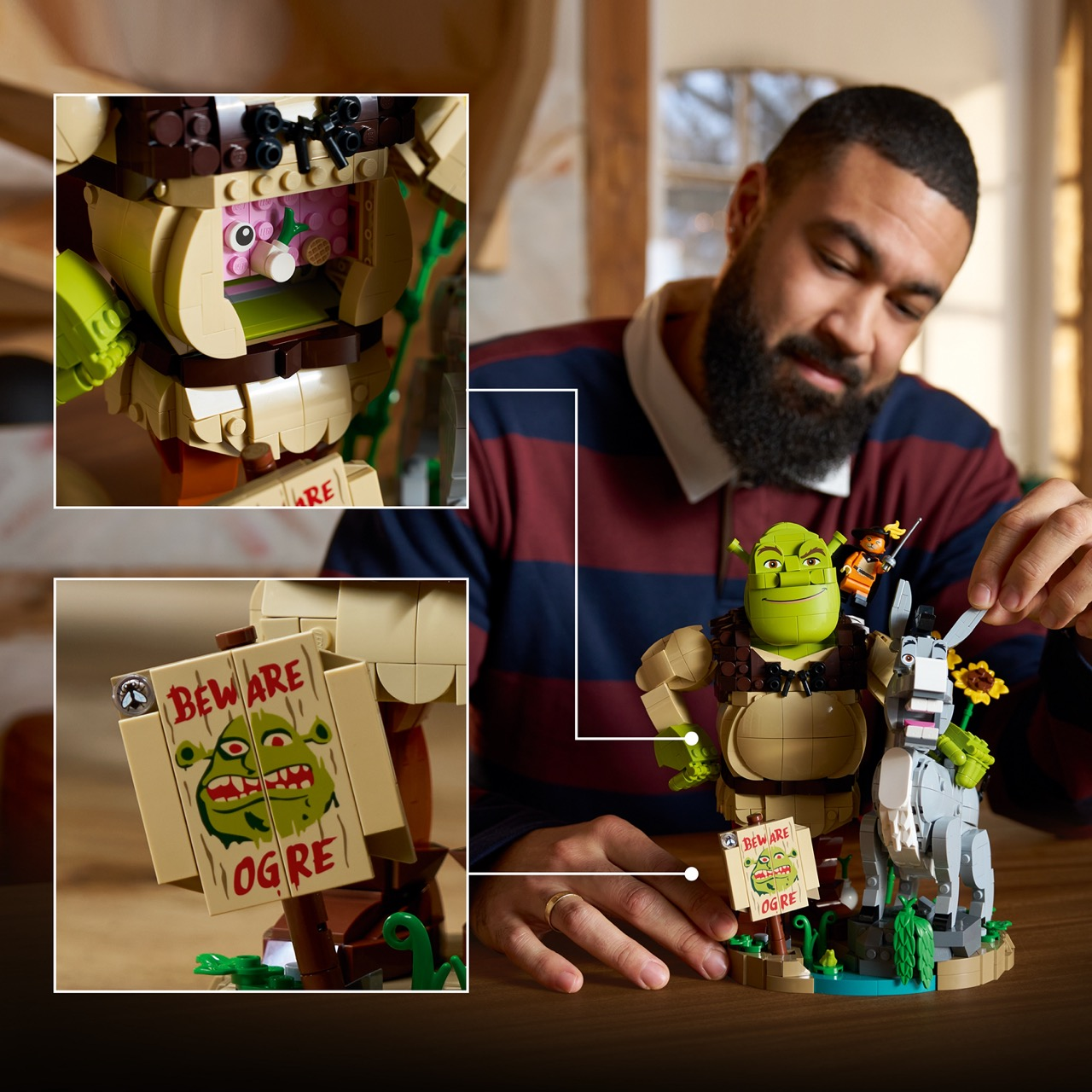 Un hombre construye un set de Lego de Shrek con figuras de Shrek, Burro y el Gato con Botas, y un cartel.