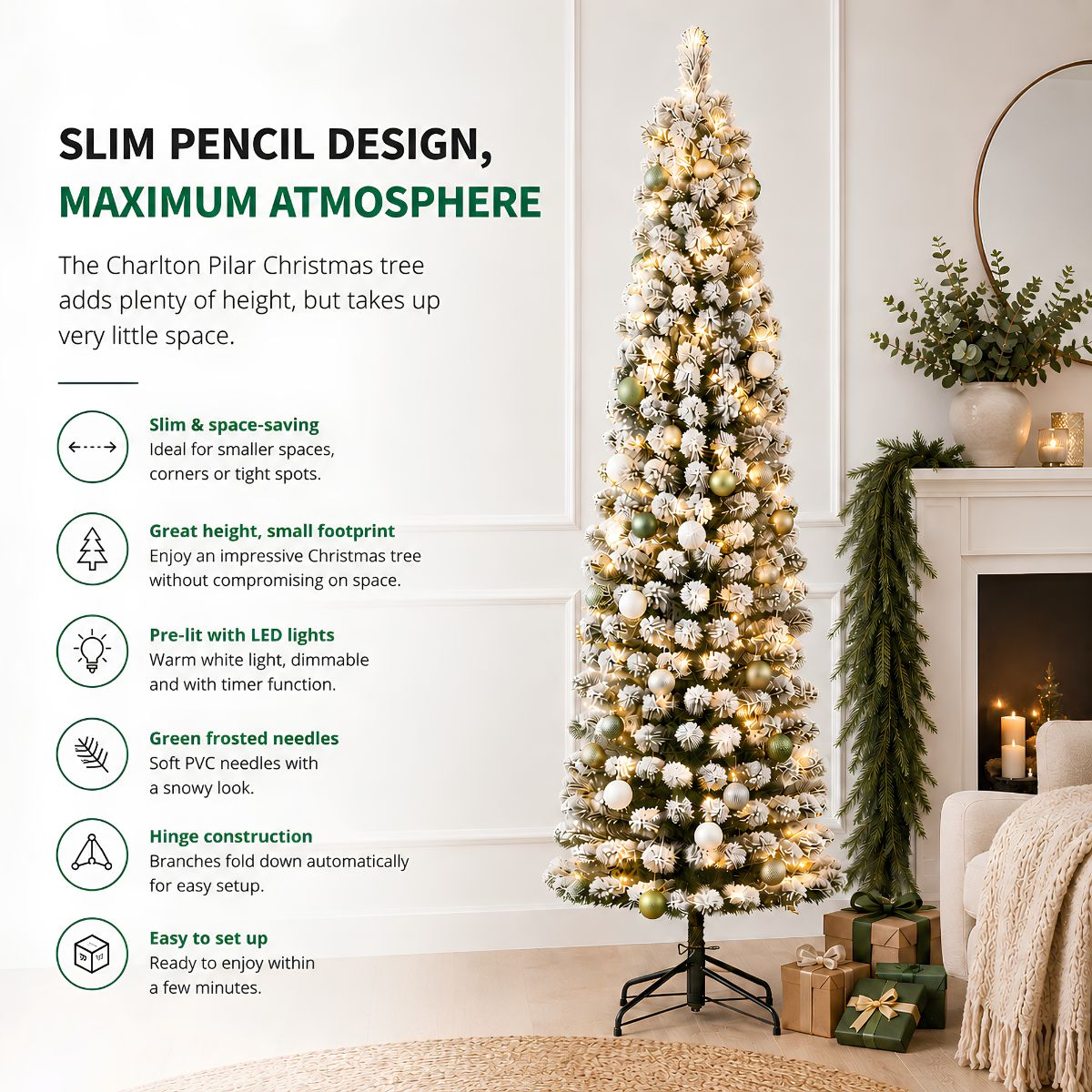 A slim, snow-frosted Christmas tree with lights and baubles stands next to a fireplace and presents.
