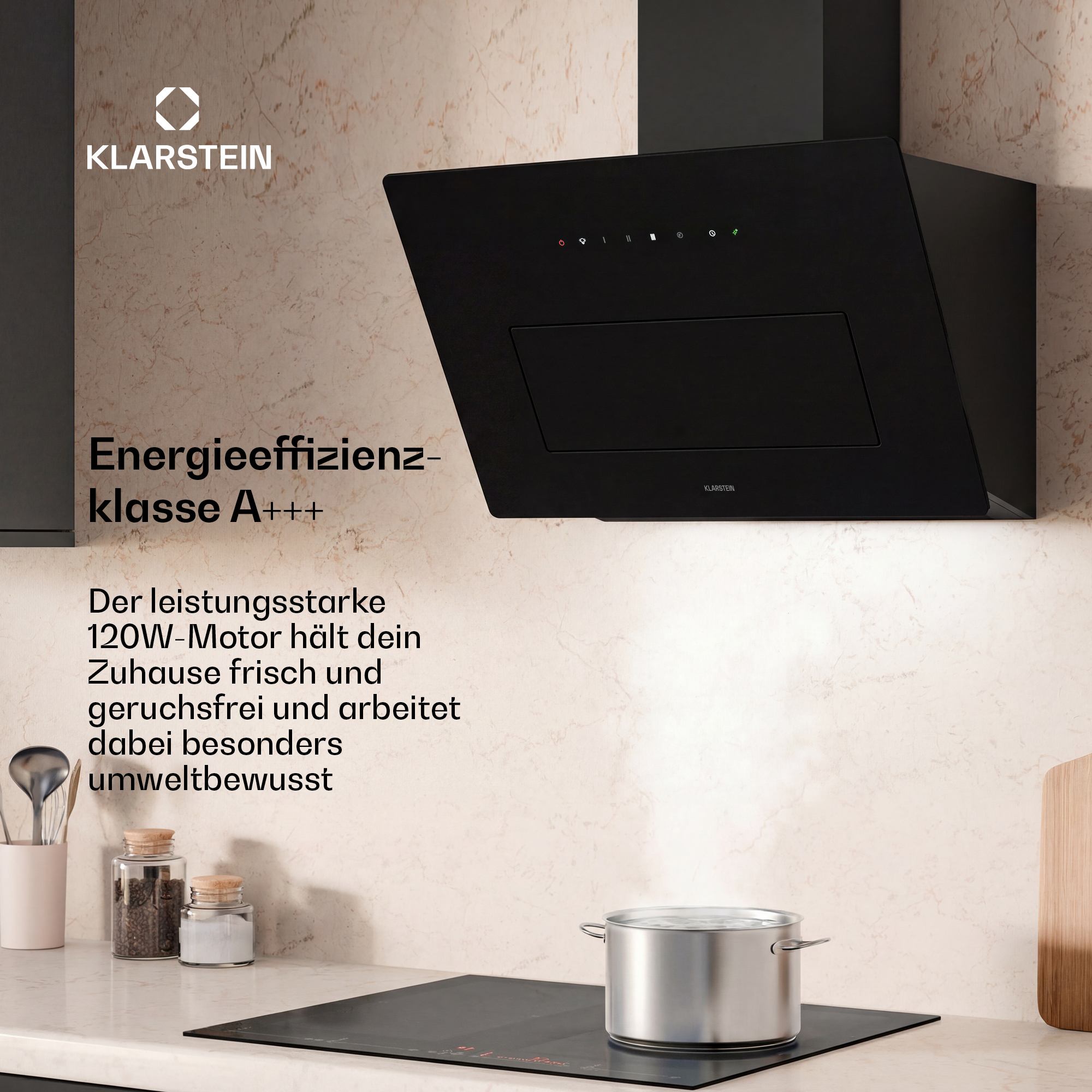 Moderne schwarze Dunstabzugshaube über einem Kochfeld mit Topf und Text auf beigem Marmor.