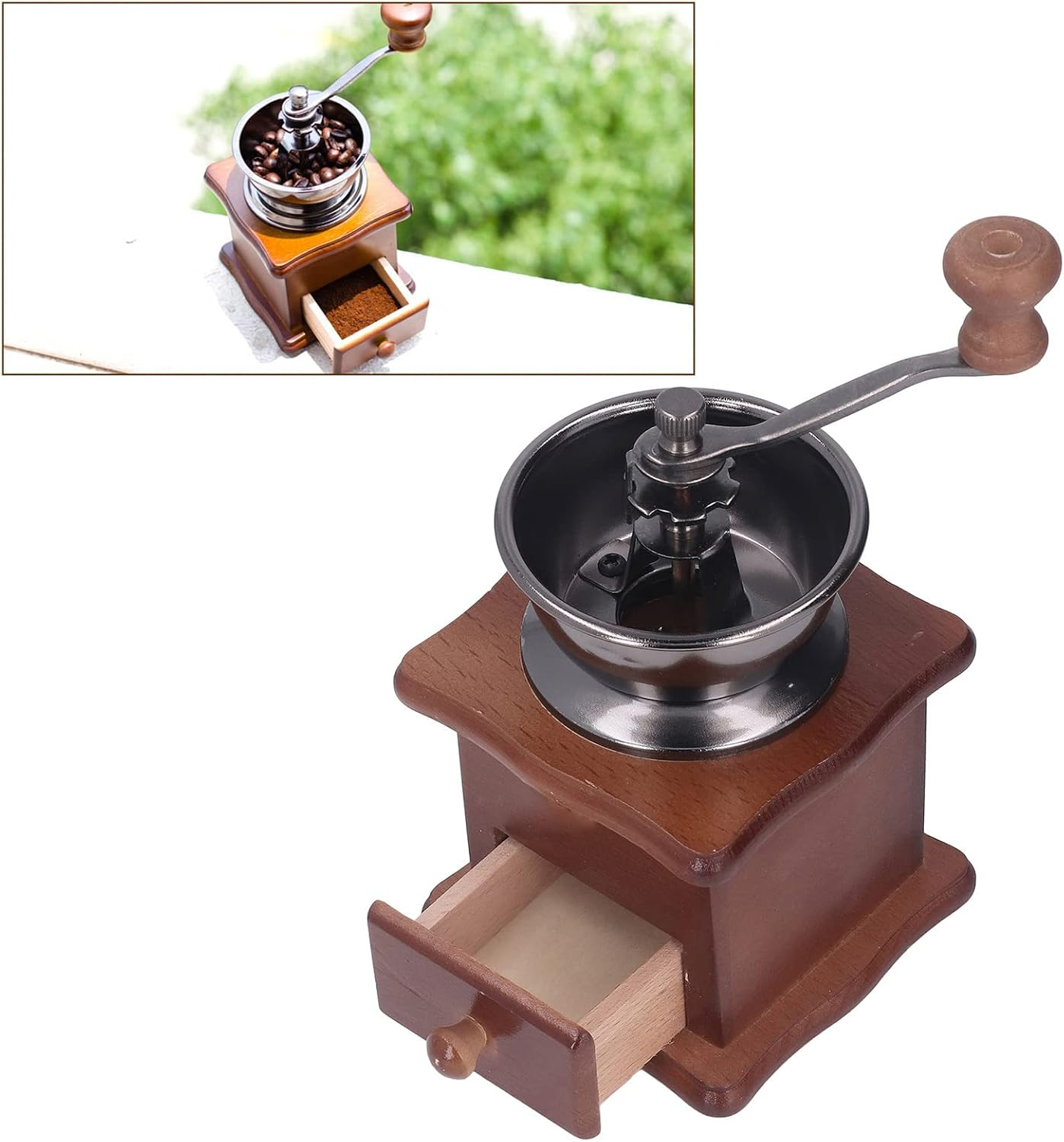 Eine alte Kaffeemühle aus Holz mit einer kleinen offenen Schublade und einer Handkurbel oben.