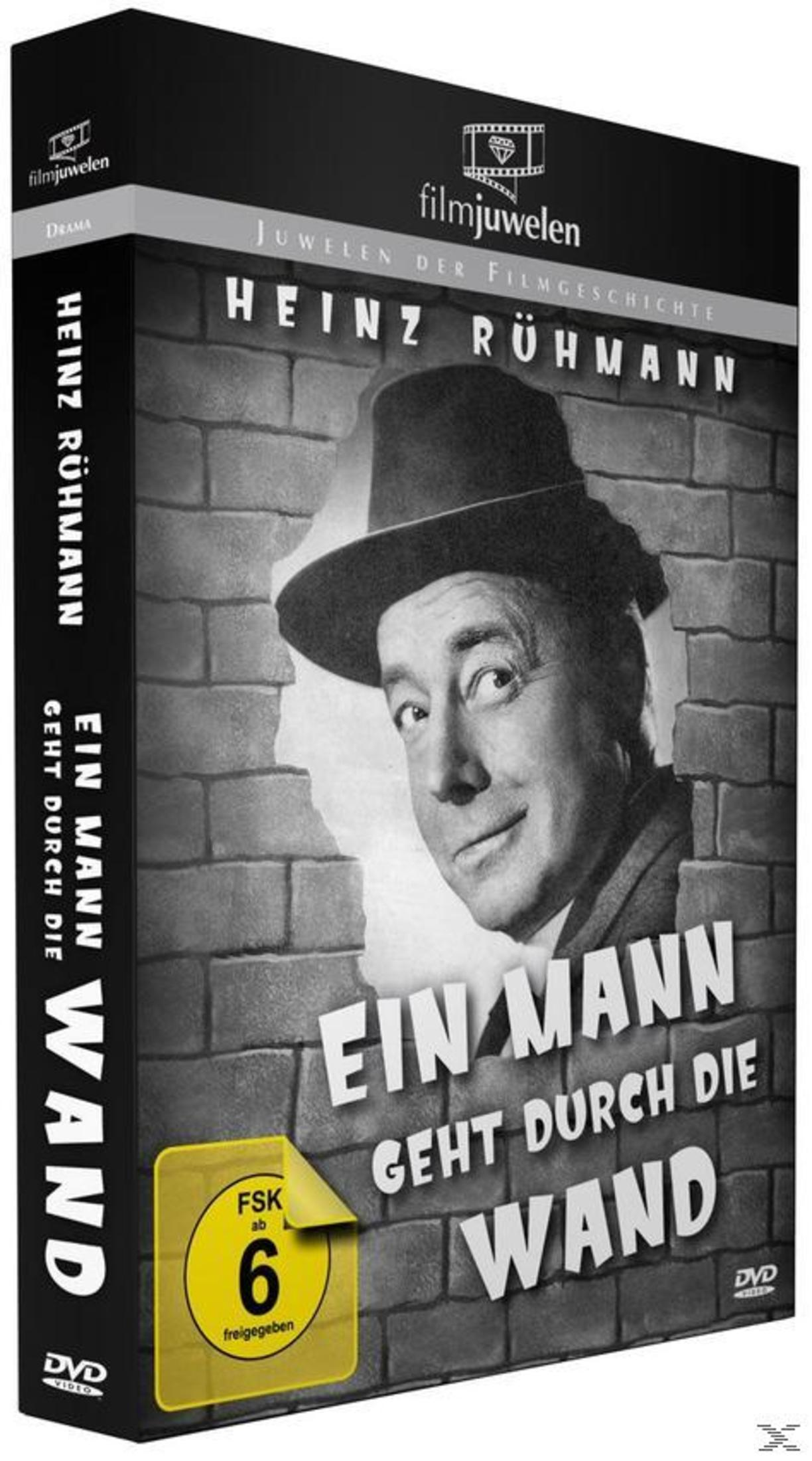 DVD-Cover mit Heinz Rühmann in Ein Mann geht durch die Wand vor einer Steinwand.