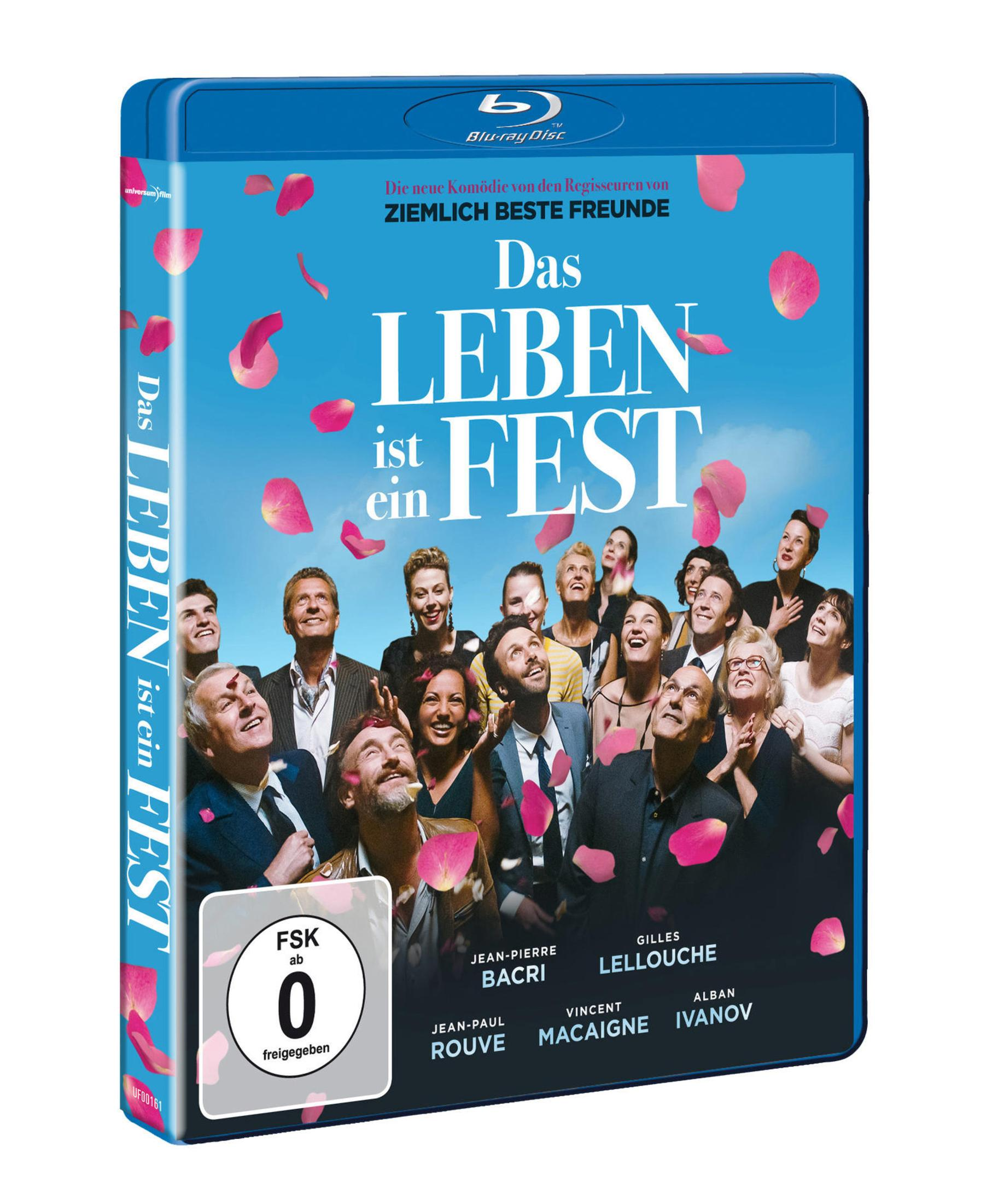 Blu-ray-Hülle des Films Das Leben ist ein Fest, mit einer Gruppe glücklicher Menschen und pinken Blütenblättern.