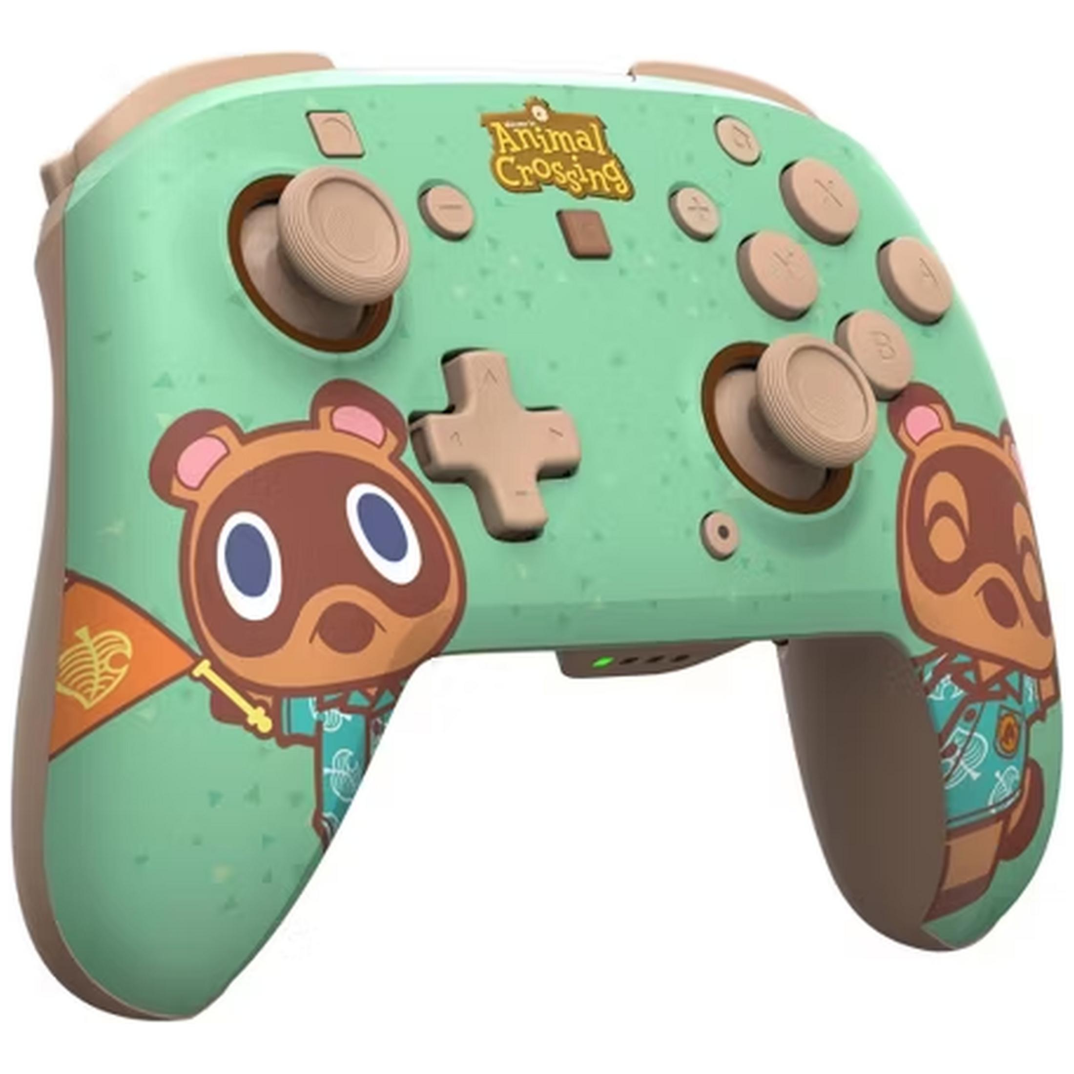 Ein Animal Crossing-Controller in Mintgrün mit braunen Akzenten und Bildern von Tom Nooks Neffen.