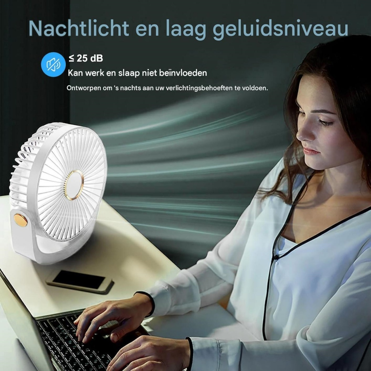 Frau tippt am Laptop neben einem leisen, weißen Tischventilator mit Nachtlicht.