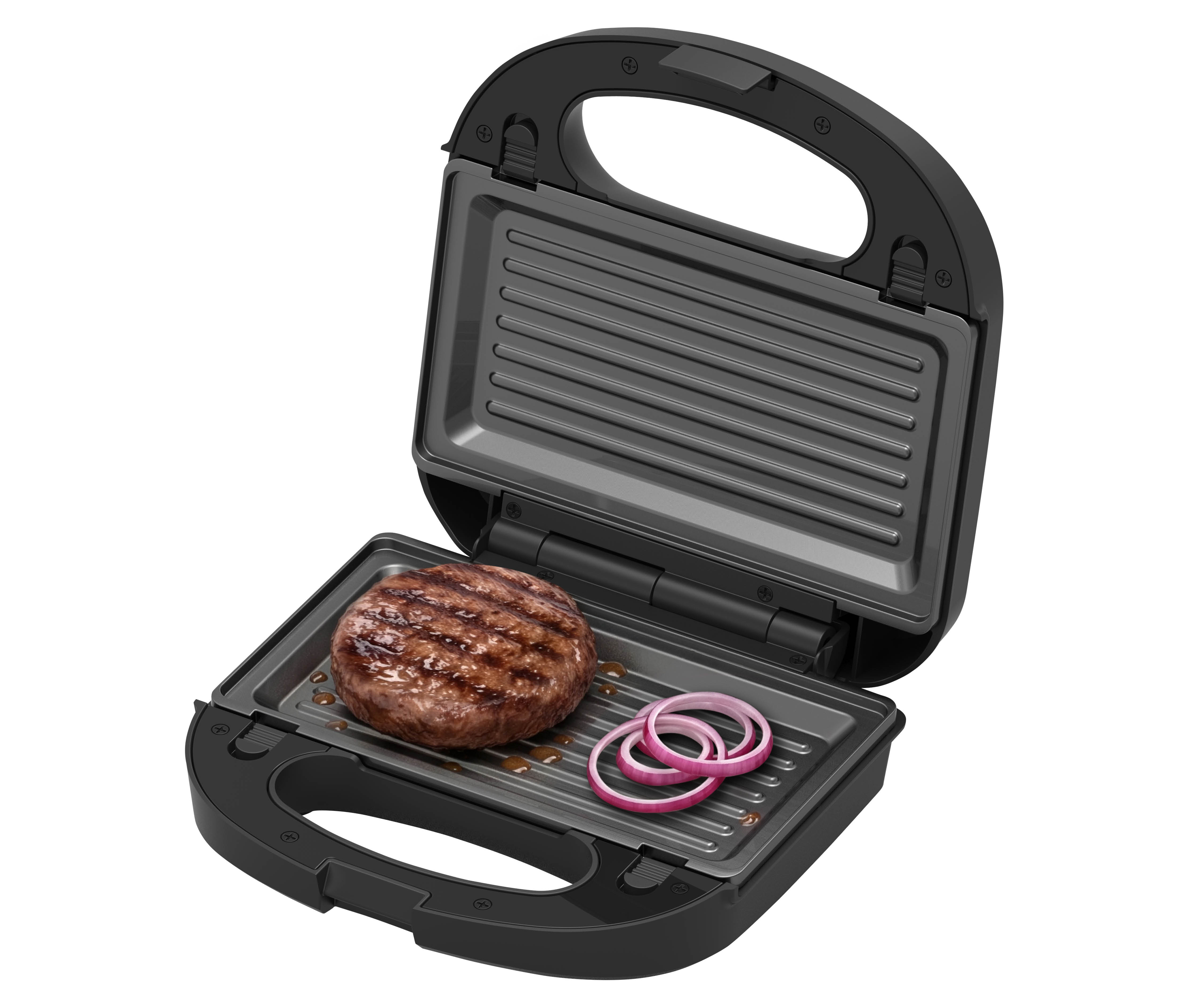 Ein offener schwarzer Tischgrill mit einem gegrillten Burger-Patty und roten Zwiebelringen auf der gerippten Platte.
