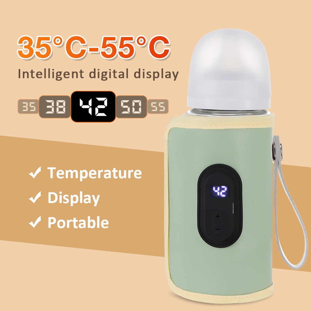 Ein Babyfläschchen in einer grünen Thermohülle mit digitaler Temperaturanzeige vor beigem Hintergrund.