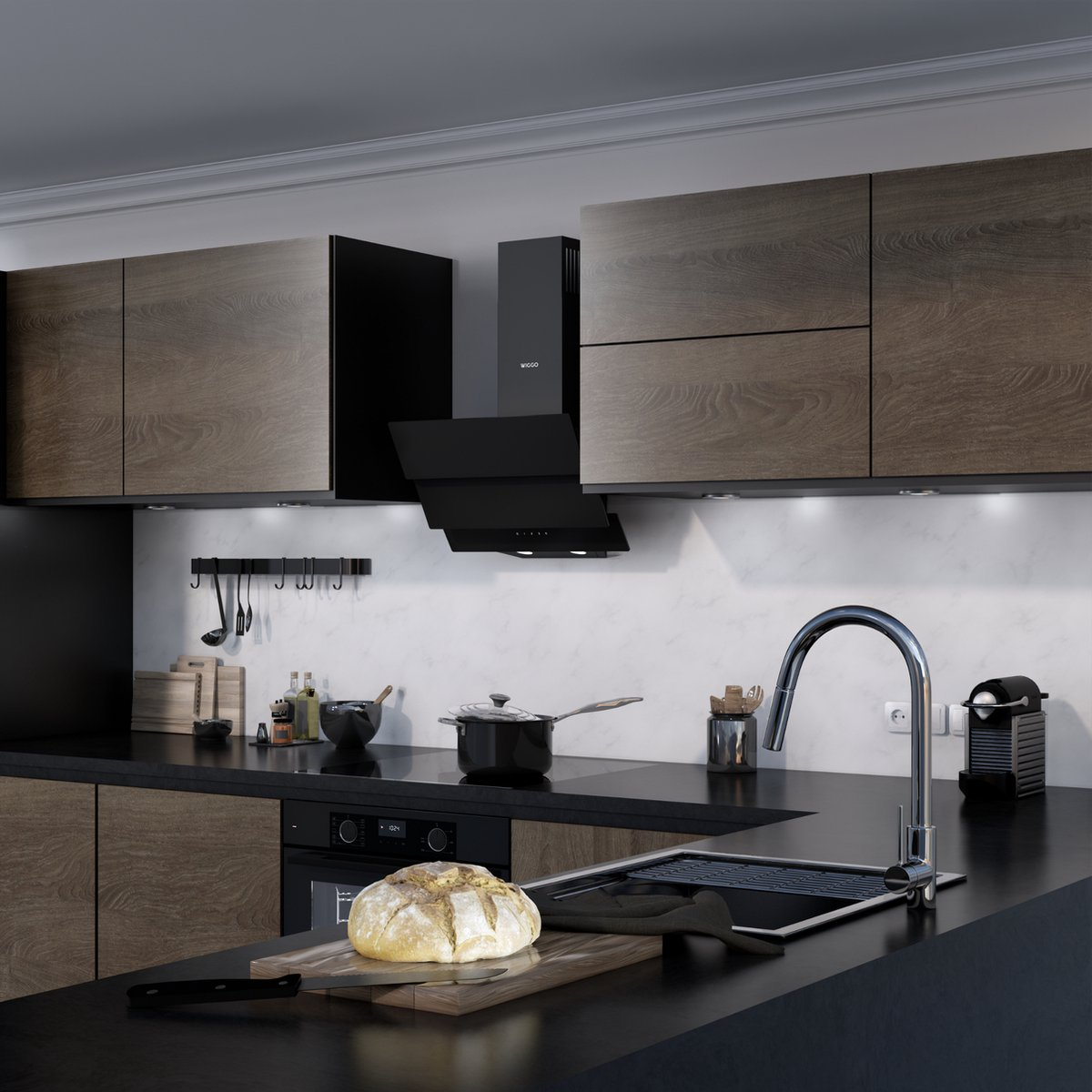 Modern kitchen with wood cabinets, black countertop, range hood, sink, and fresh bread on a cutting board.