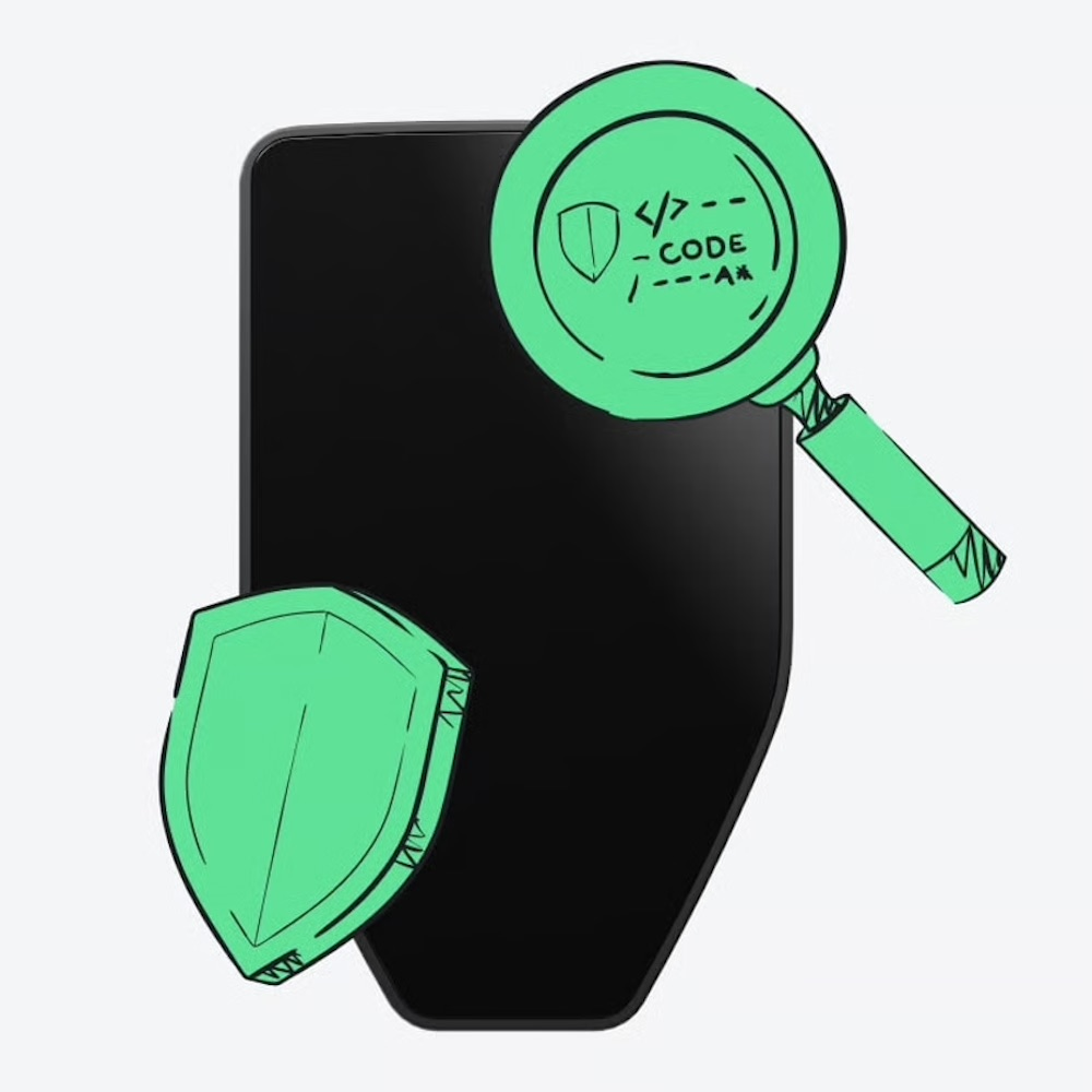 Czarny smartfon z zieloną lupą i zieloną tarczą obok.