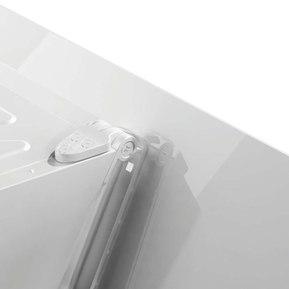 Close-up of a white hinge on a white surface against a bright background.