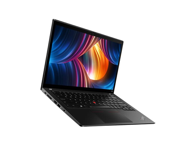 Un computer portatile nero con uno sfondo astratto e colorato sullo schermo su sfondo bianco.
