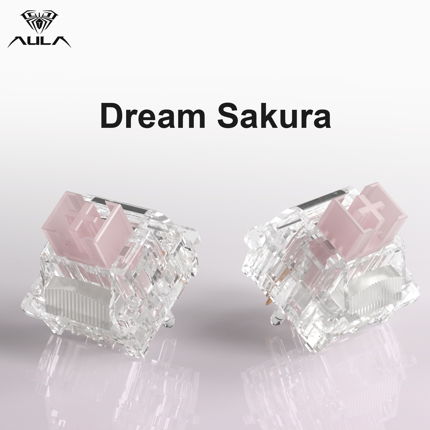 Beyaz arka plan üzerinde pembe gövdeli iki şeffaf mekanik klavye anahtarı ve Dream Sakura yazısı.