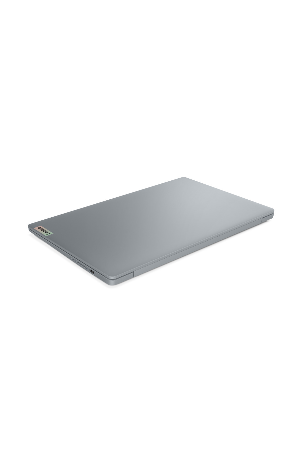 Beyaz arkaplanda kapalı gri bir Lenovo dizüstü bilgisayar.