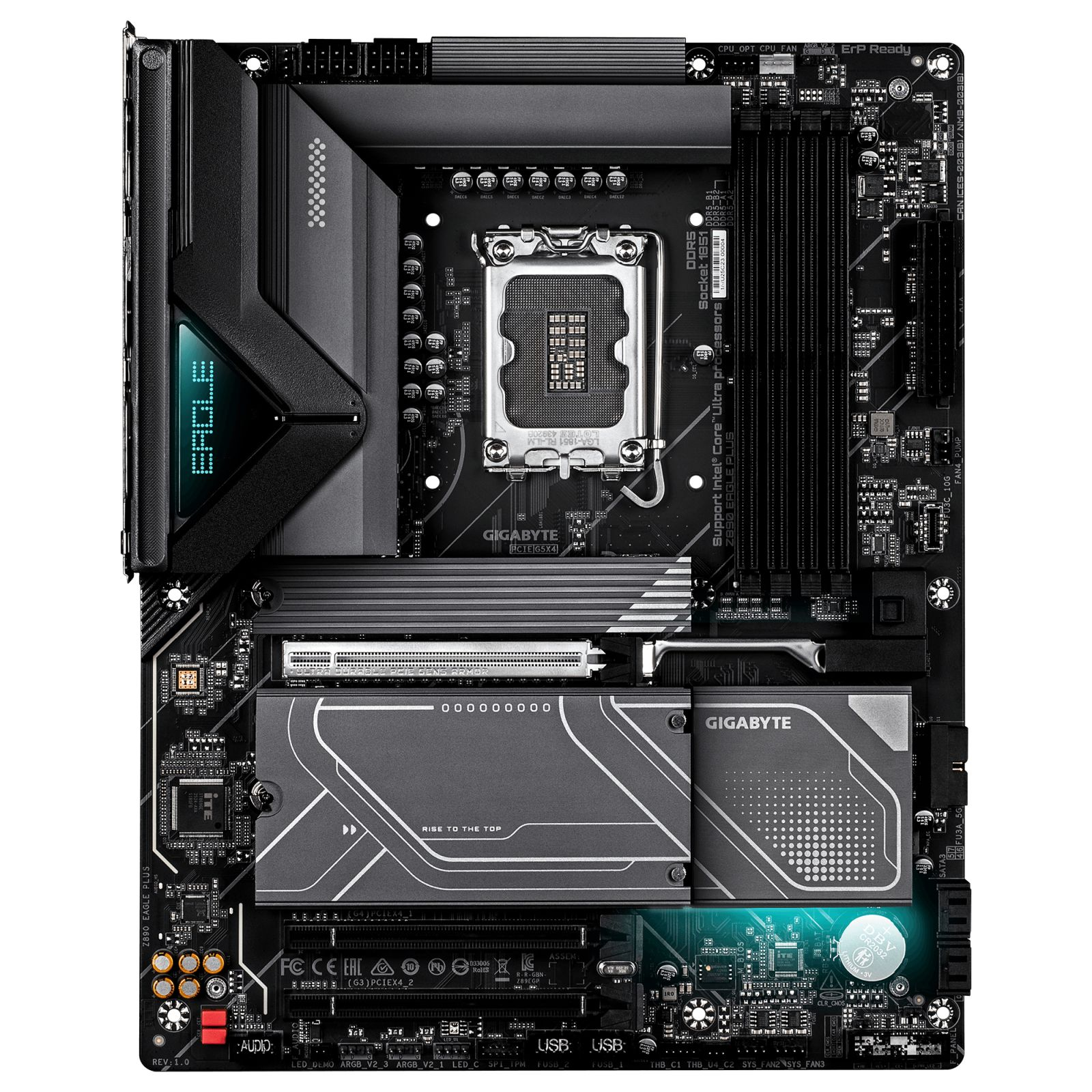 Una scheda madre per computer con circuito nero, dissipatori argentati, socket CPU e slot RAM.