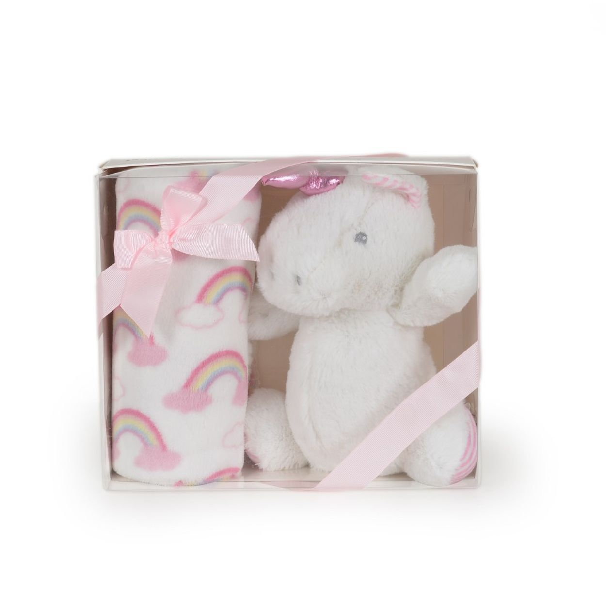 Eine durchsichtige Geschenkbox enthält eine Kuscheldecke mit Regenbogenmuster und ein Plüscheinhorn.