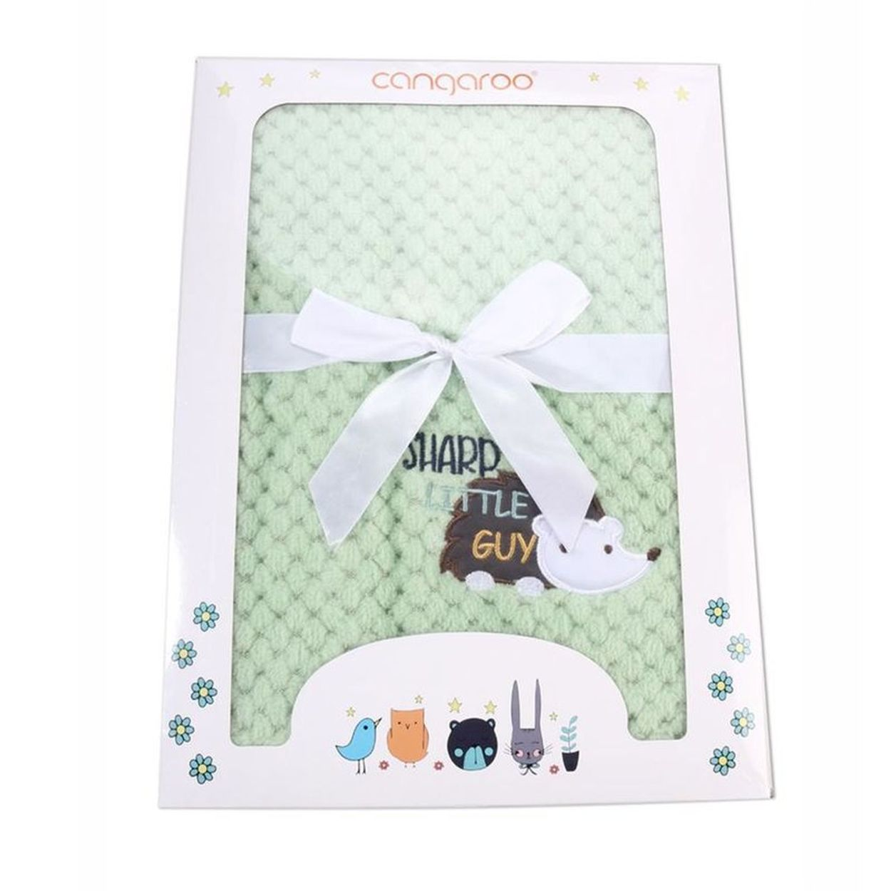 Eine grüne Babydecke mit weißer Schleife und Igel-Aufdruck, verpackt in einer bunten Schachtel.