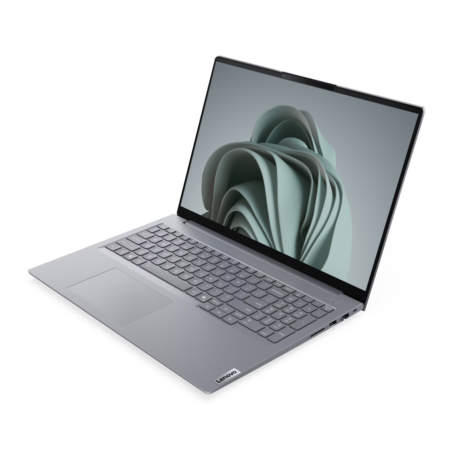 Beyaz arka plan üzerinde soyut, yeşil ekran duvar kağıdına sahip gri bir Lenovo dizüstü bilgisayar.