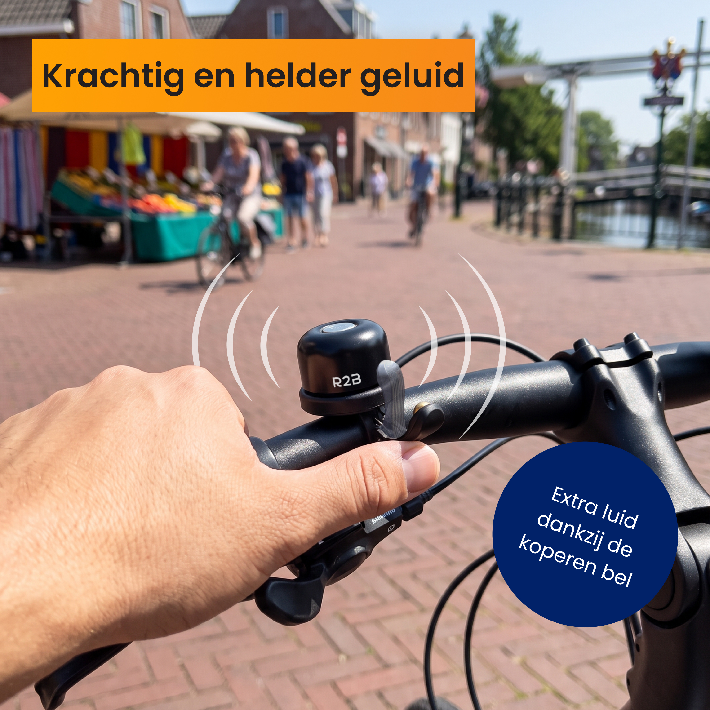 Hand greift nach der R2B-Fahrradklingel an einem Lenker mit Text overlays.