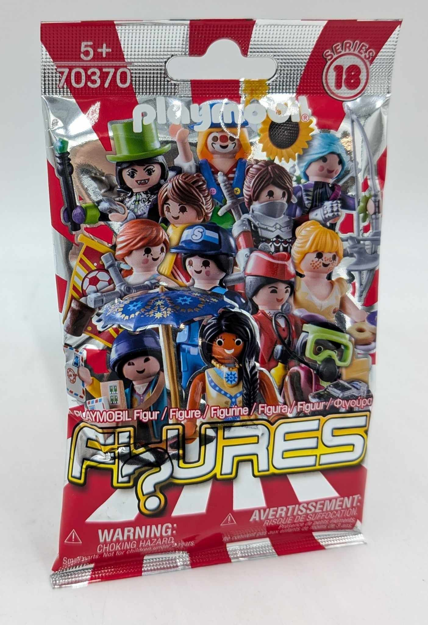 Playmobil Figuren Series 18 Überraschungstüte mit verschiedenen Spielzeugfiguren.