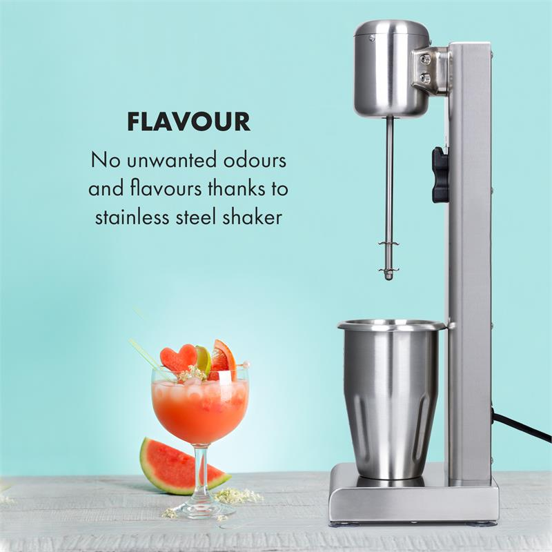 Ein Edelstahldrinkmixer steht neben einem Cocktail mit Wassermelone vor einem türkisen Hintergrund mit Text.