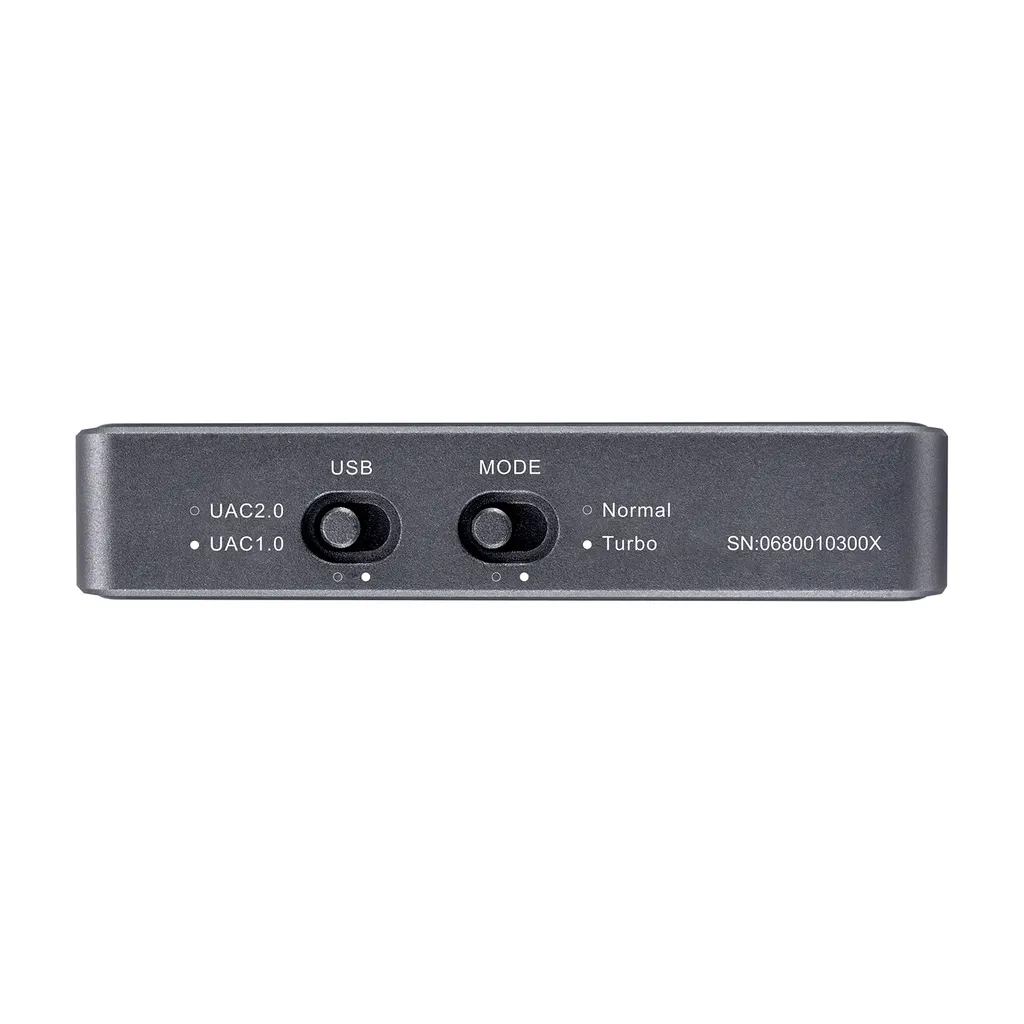 Graues elektronisches Gerät mit zwei Schaltern für USB und Mode sowie Seriennummer.