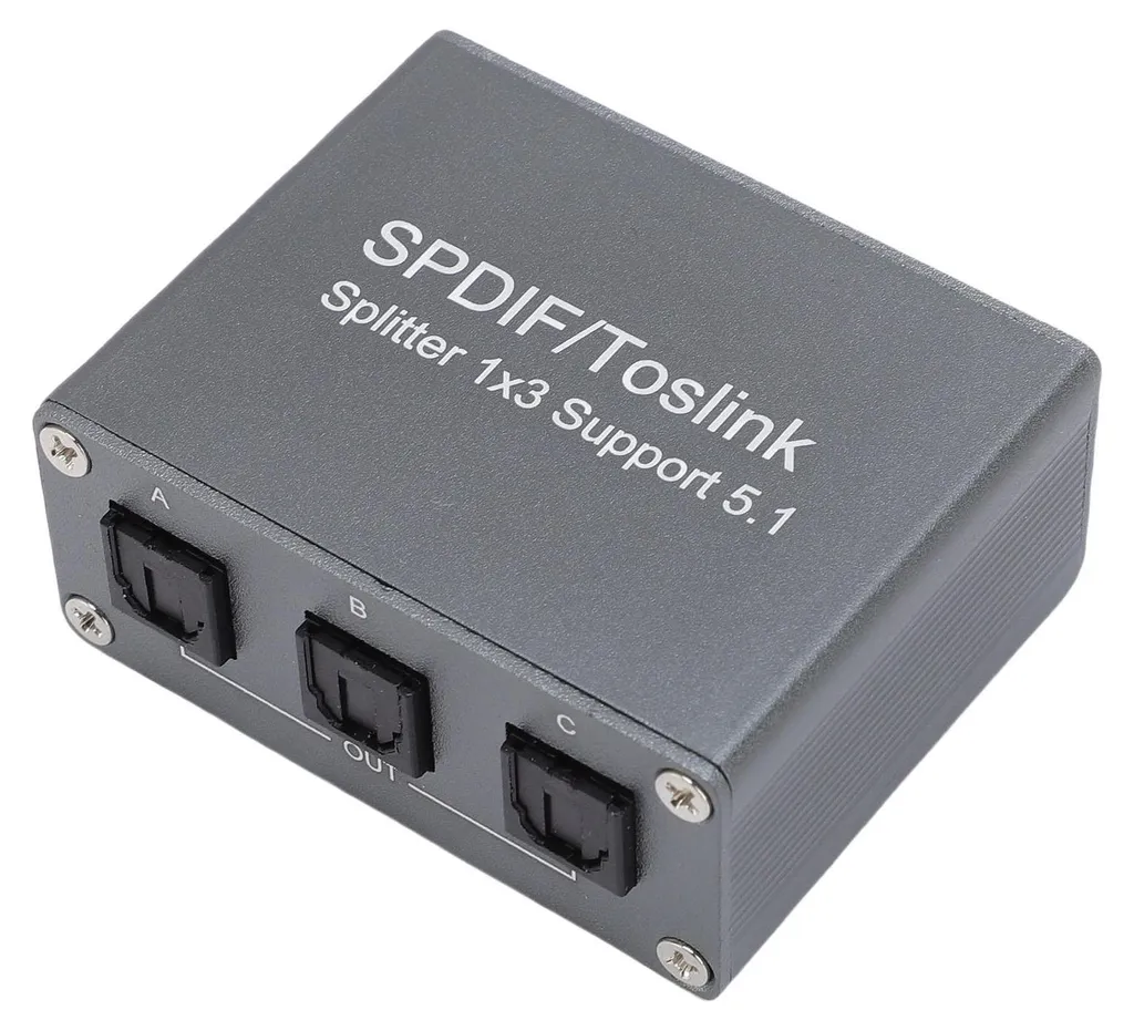 Ein grauer SPDIF/Toslink-Splitter mit drei Ausgangsports auf einer weißen Oberfläche.