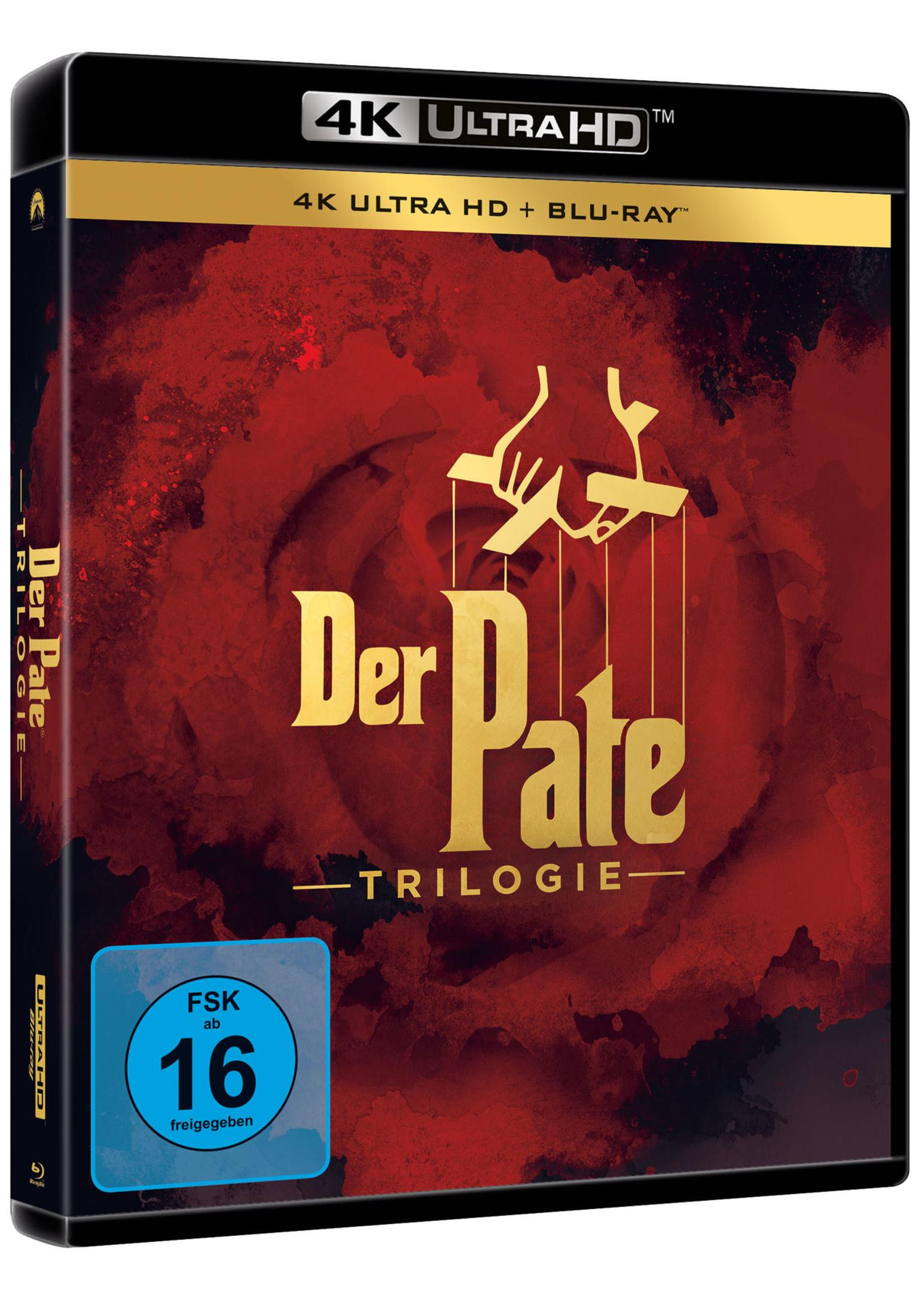 Der Pate Trilogie 4K Ultra HD und Blu-ray Cover mit rotem Hintergrund und goldenen Marionettenfäden.