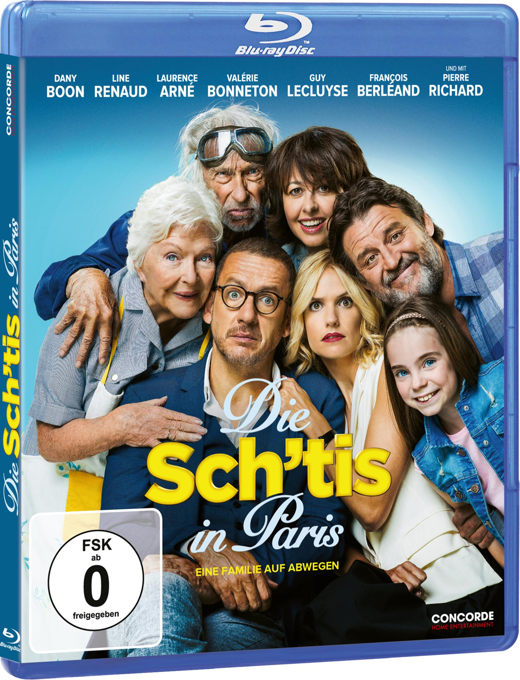 Blu-ray-Cover von Die Sch't'is in Paris mit einer Gruppe von sieben Personen, die nah beieinander stehen.