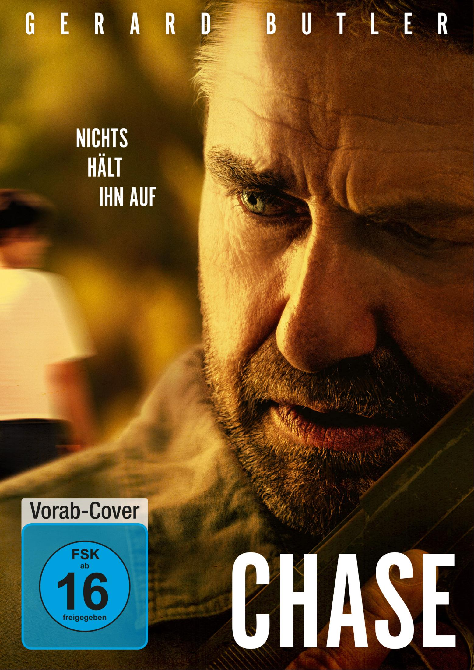 Nahaufnahme von Gerard Butler in Chase mit ernstem Blick und Waffe.
