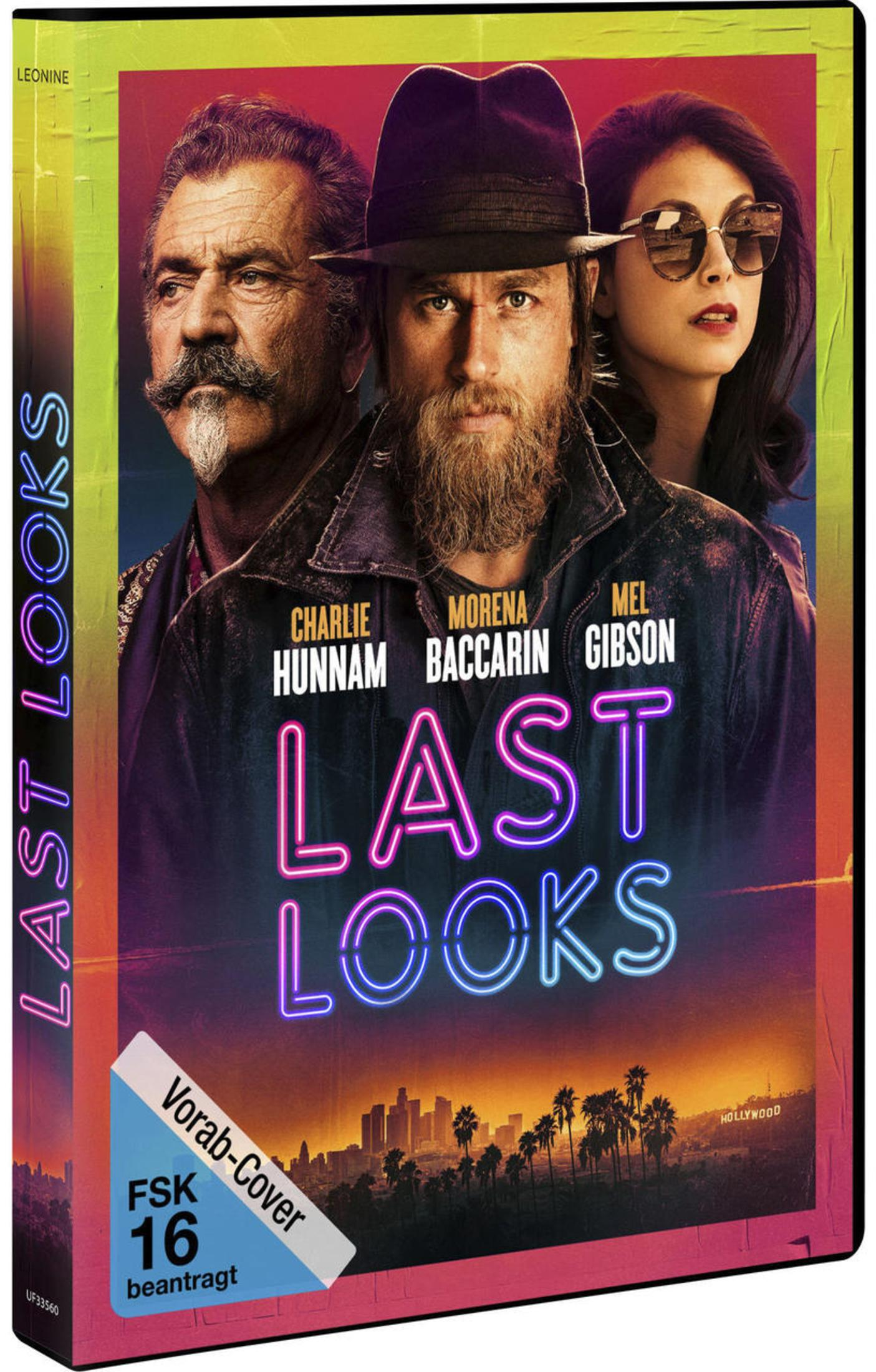 DVD-Hülle des Films Last Looks mit Charlie Hunnam, Morena Baccarin und Mel Gibson vor einer Skyline.