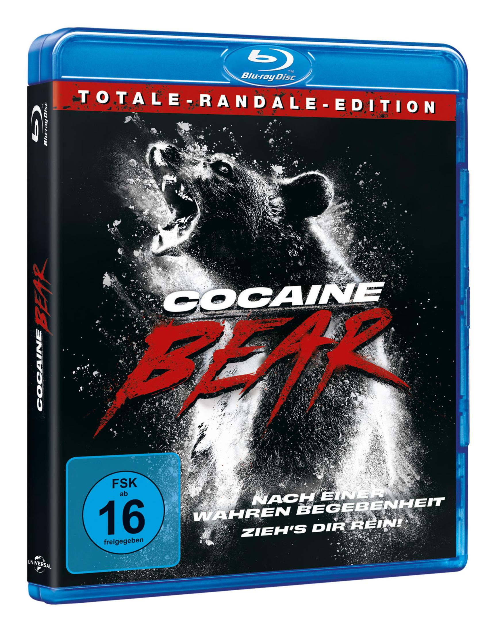 Cocaine Bear Blu-ray-Hülle mit einem wütenden Bären im Schnee und dem Filmtitel in roter und weißer Schrift.