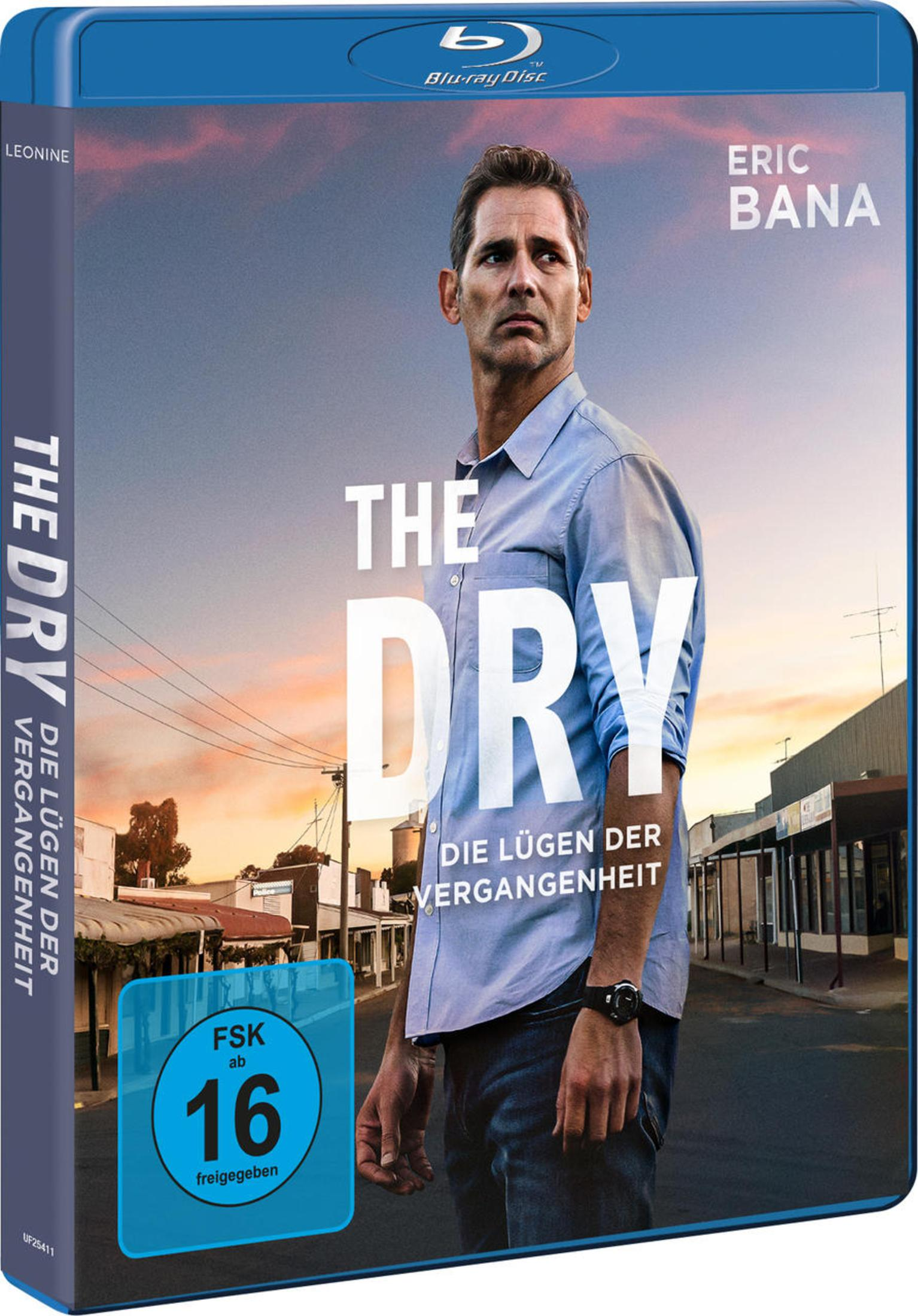 Blu-Ray-Cover des Films "The Dry" mit Eric Bana vor einer Straße in einer ländlichen Stadt bei Sonnenuntergang.