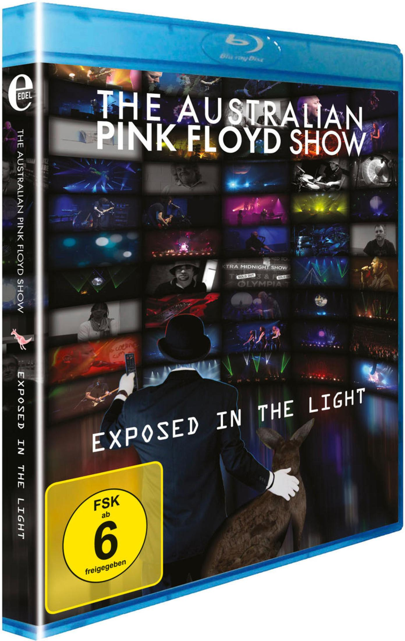 Blu-ray-Cover für The Australian Pink Floyd Show mit einem Mann im Anzug, der Bildschirme und ein Känguru betrachtet.