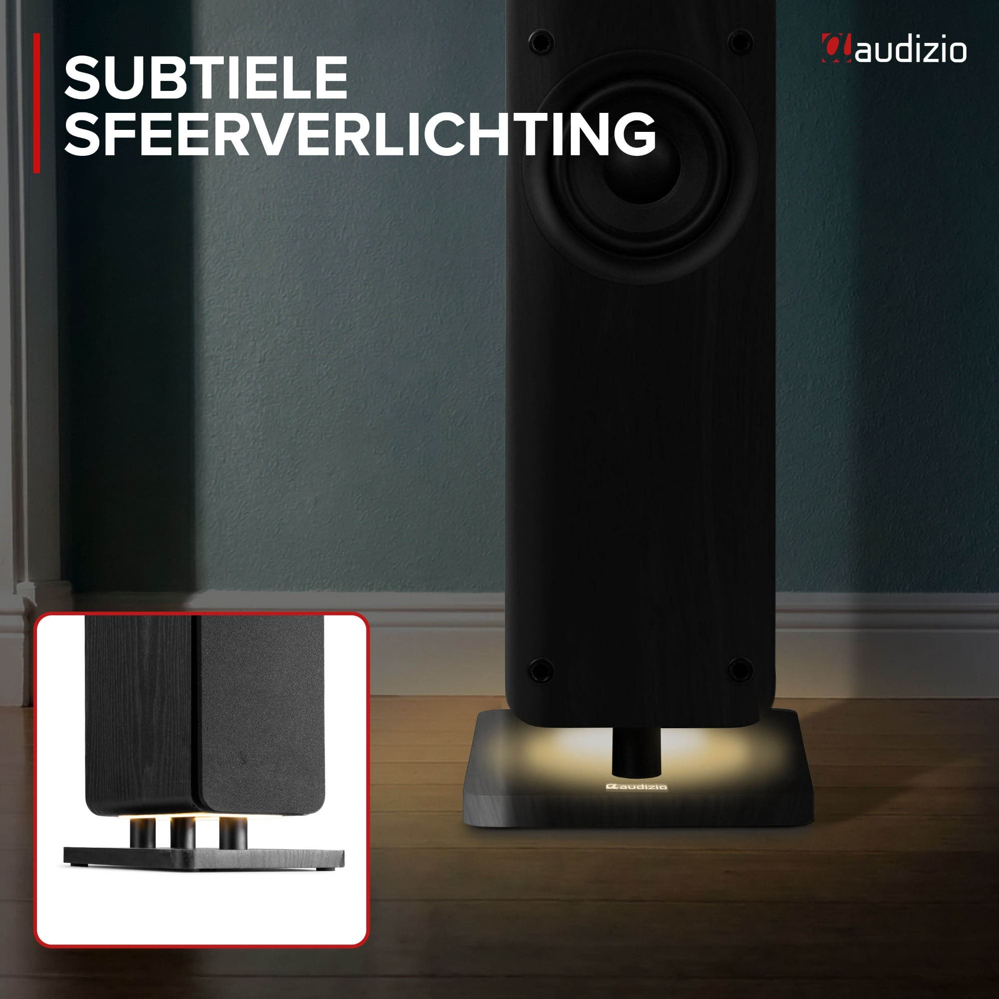 Altavoz de suelo negro Audizio con sutil iluminación inferior en una habitación.