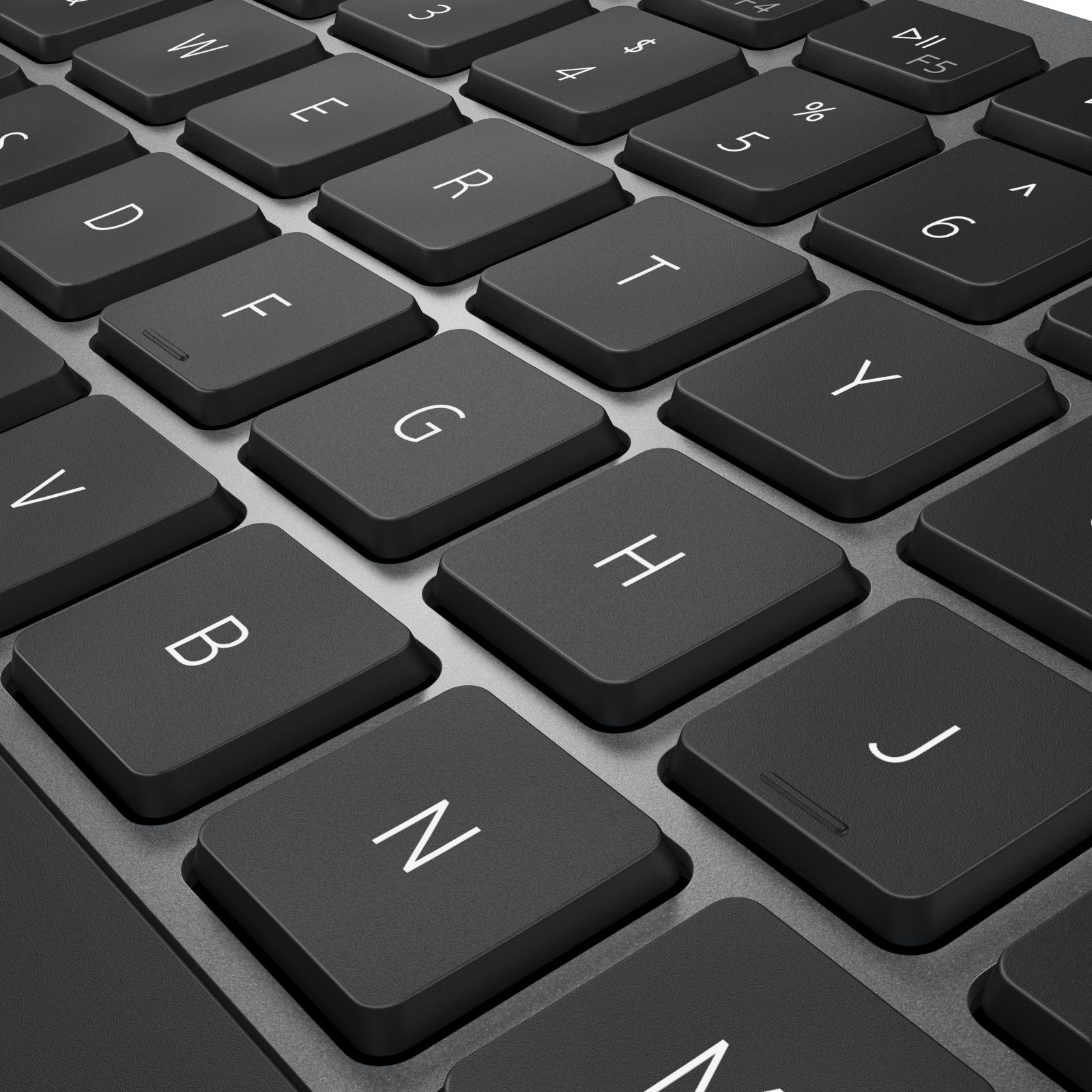 Nahaufnahme einer modernen schwarzen Computertastatur mit weißen Buchstaben.