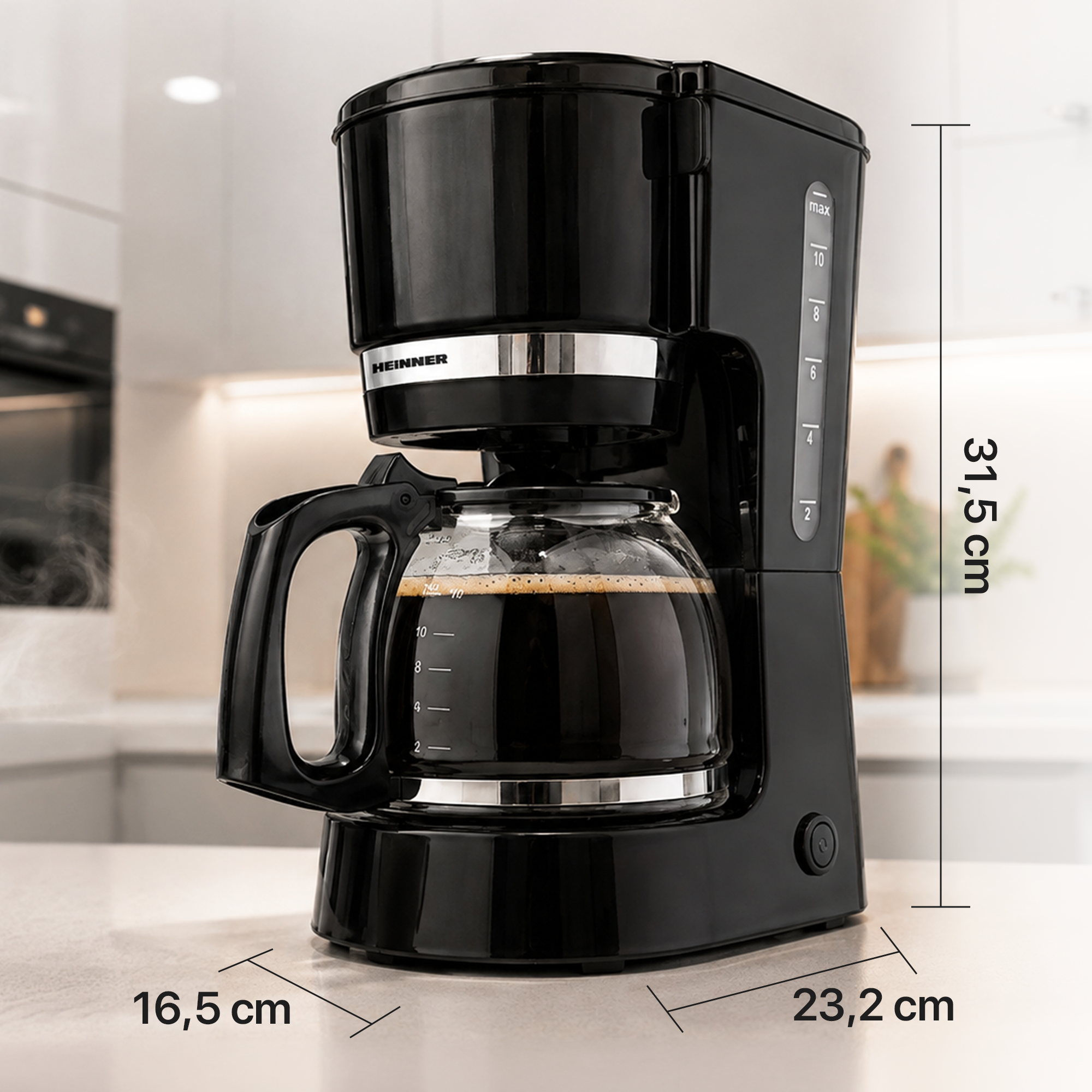 A black drip coffee maker on a counter, with dimensions 31.5 cm high, 16.5 cm wide, and 23.2 cm deep shown.