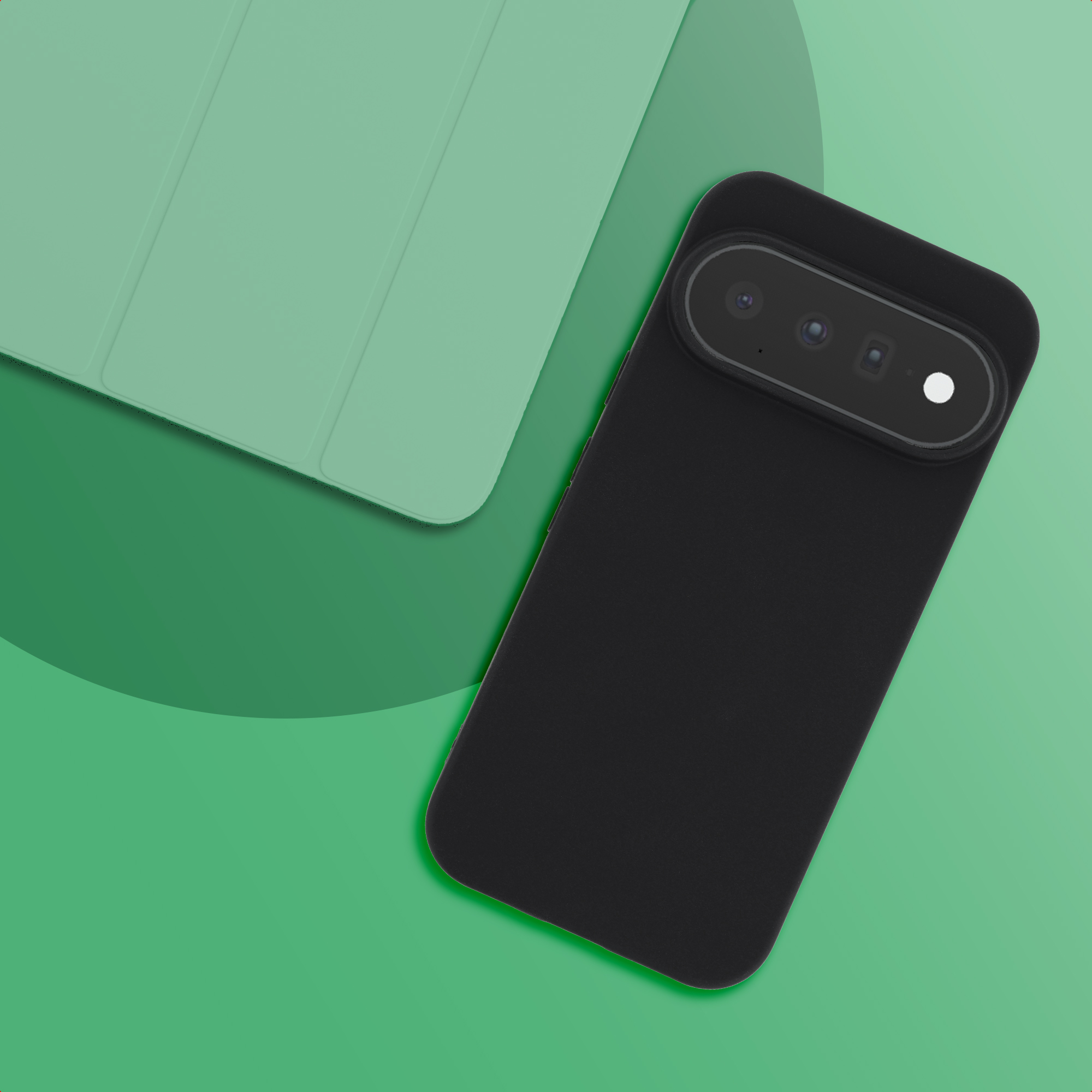 A black smartphone with a triple camera bar on a green background next to a matching green tablet case.