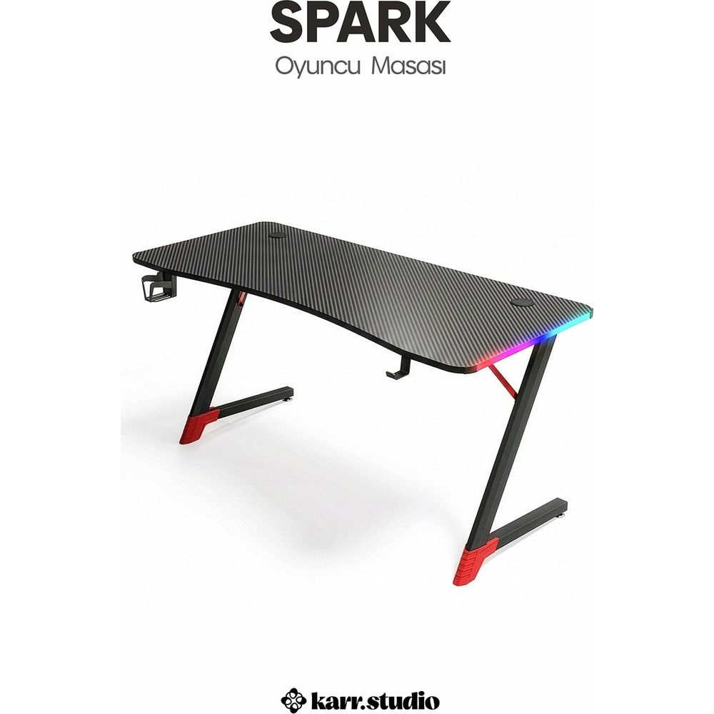 Karbon fiber yüzeyli, kırmızı detaylı ve RGB aydınlatmalı siyah Spark oyuncu masası.