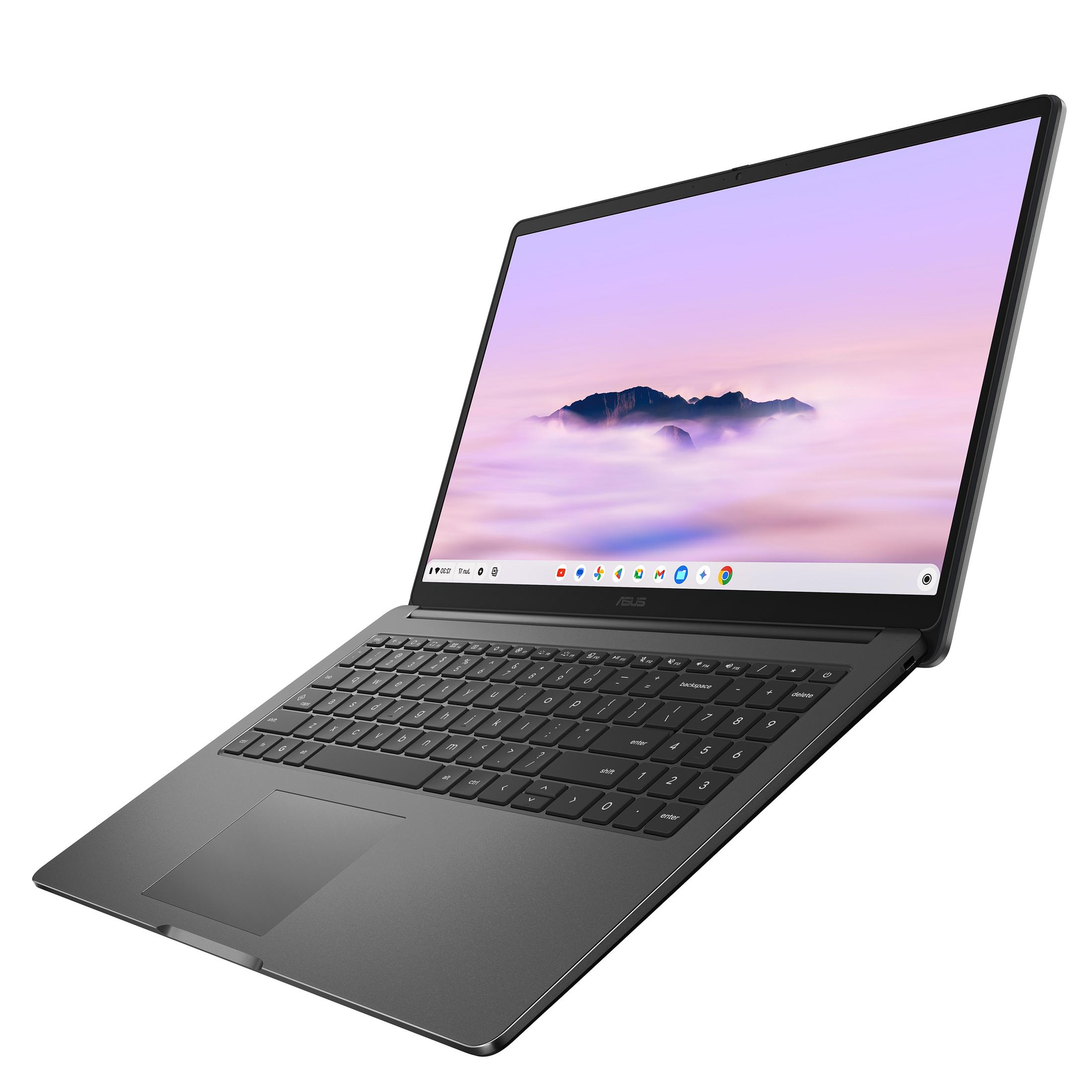 Ein grauer Laptop schräg abgebildet, mit einem hellen Bildschirm und einer schwarzen Tastatur.