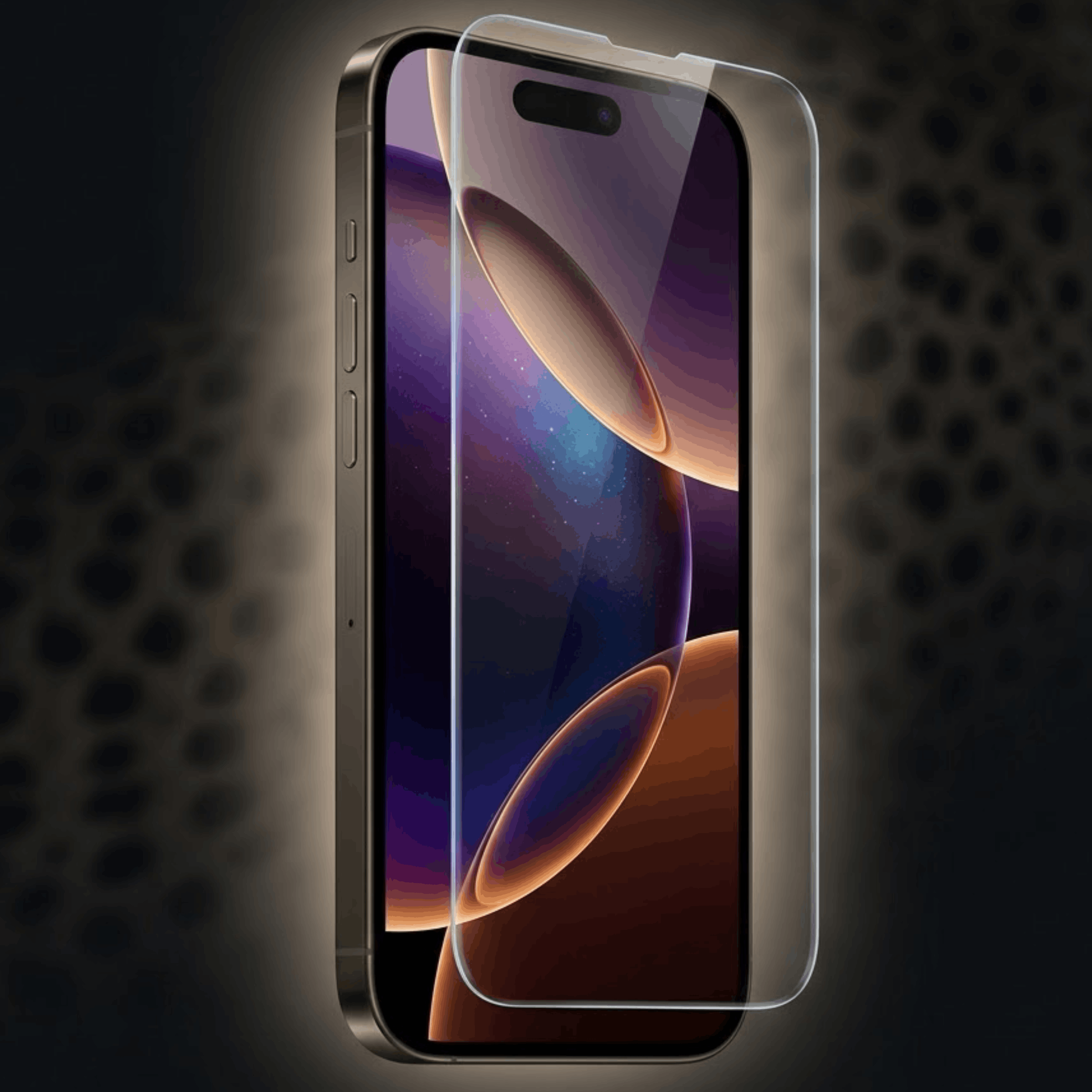 Smartfon z przezroczystą szklaną folią ochronną na pierwszym planie na ciemnym tle we wzory.