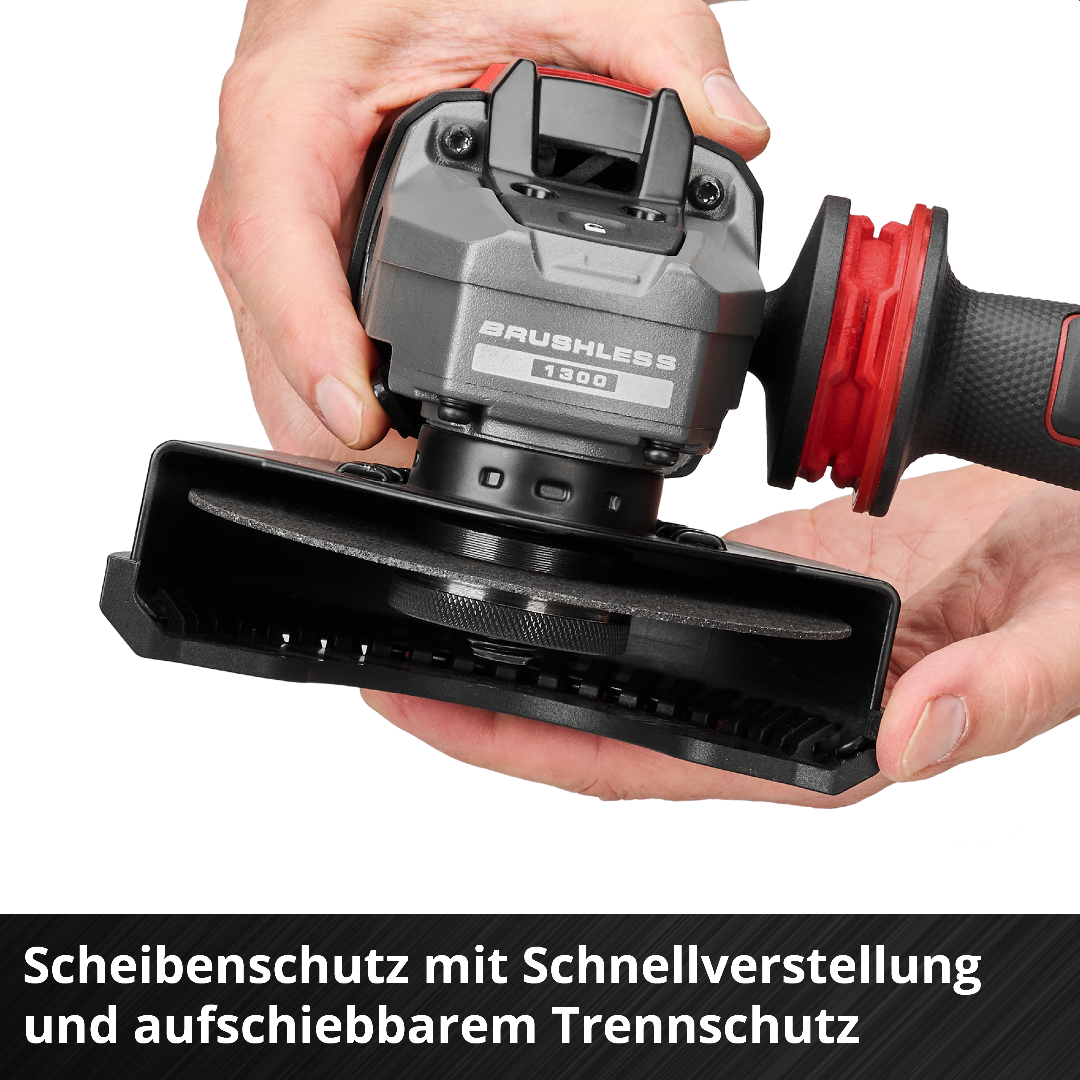Haende halten eine graue bürstenlose Schleifmaschine mit Schutz.