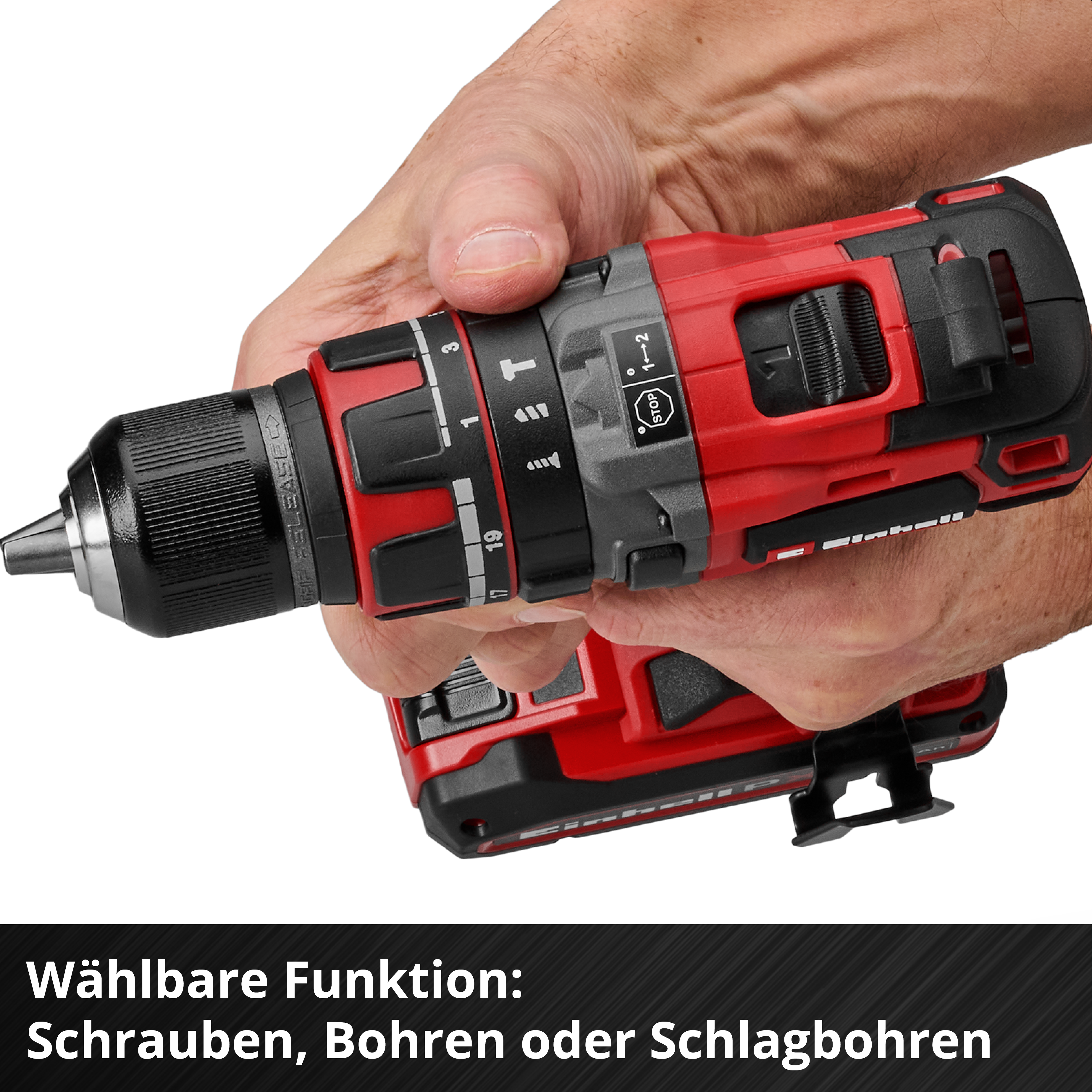 Mani che tengono un trapano a batteria Einhell rosso e nero con varie funzioni selezionabili.