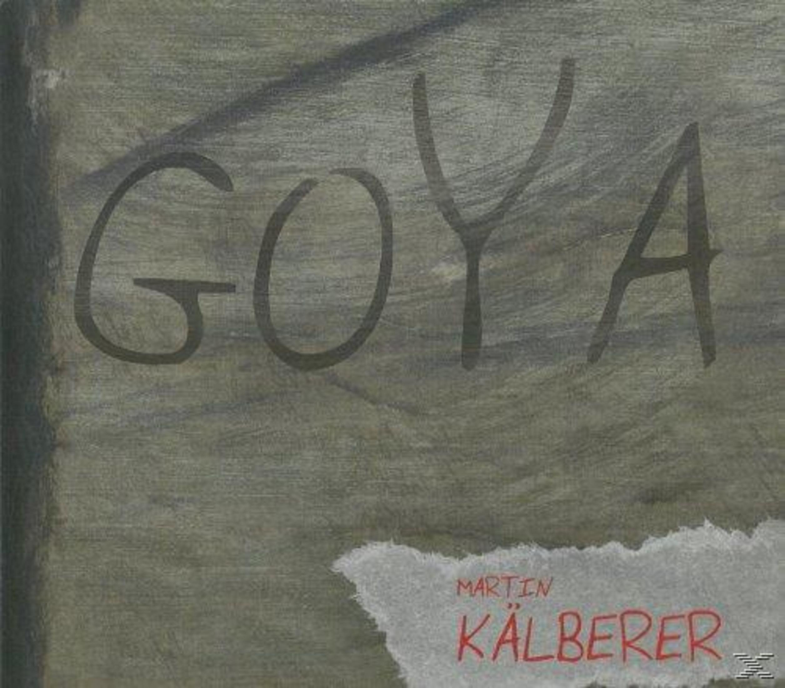 Holzplatte mit der Aufschrift Goya und dem Namen Martin Kälberer in roten Buchstaben auf einem Zettel.
