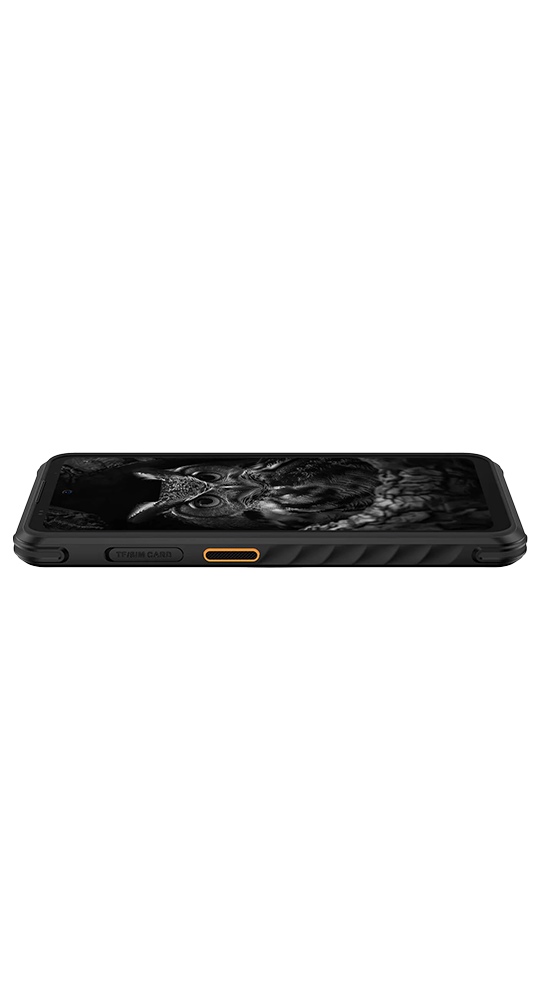Ein robustes schwarzes Smartphone liegt waagerecht vor dunklem Hintergrund, das Display zeigt eine Eule.