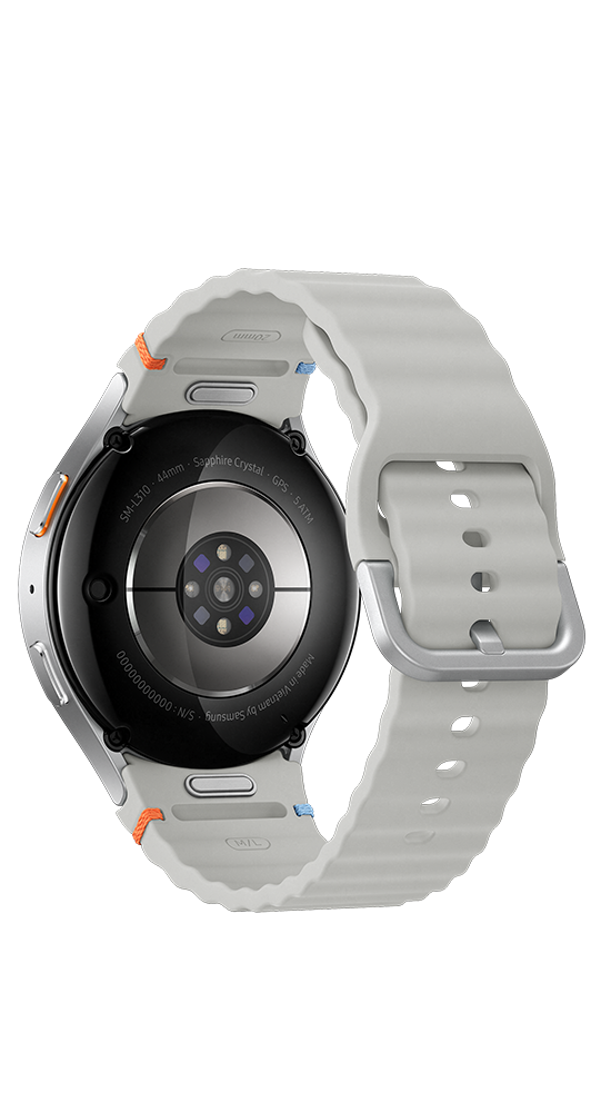 Vista posteriore di uno smartwatch con sensori, dettagli della cassa e cinturino in silicone grigio.